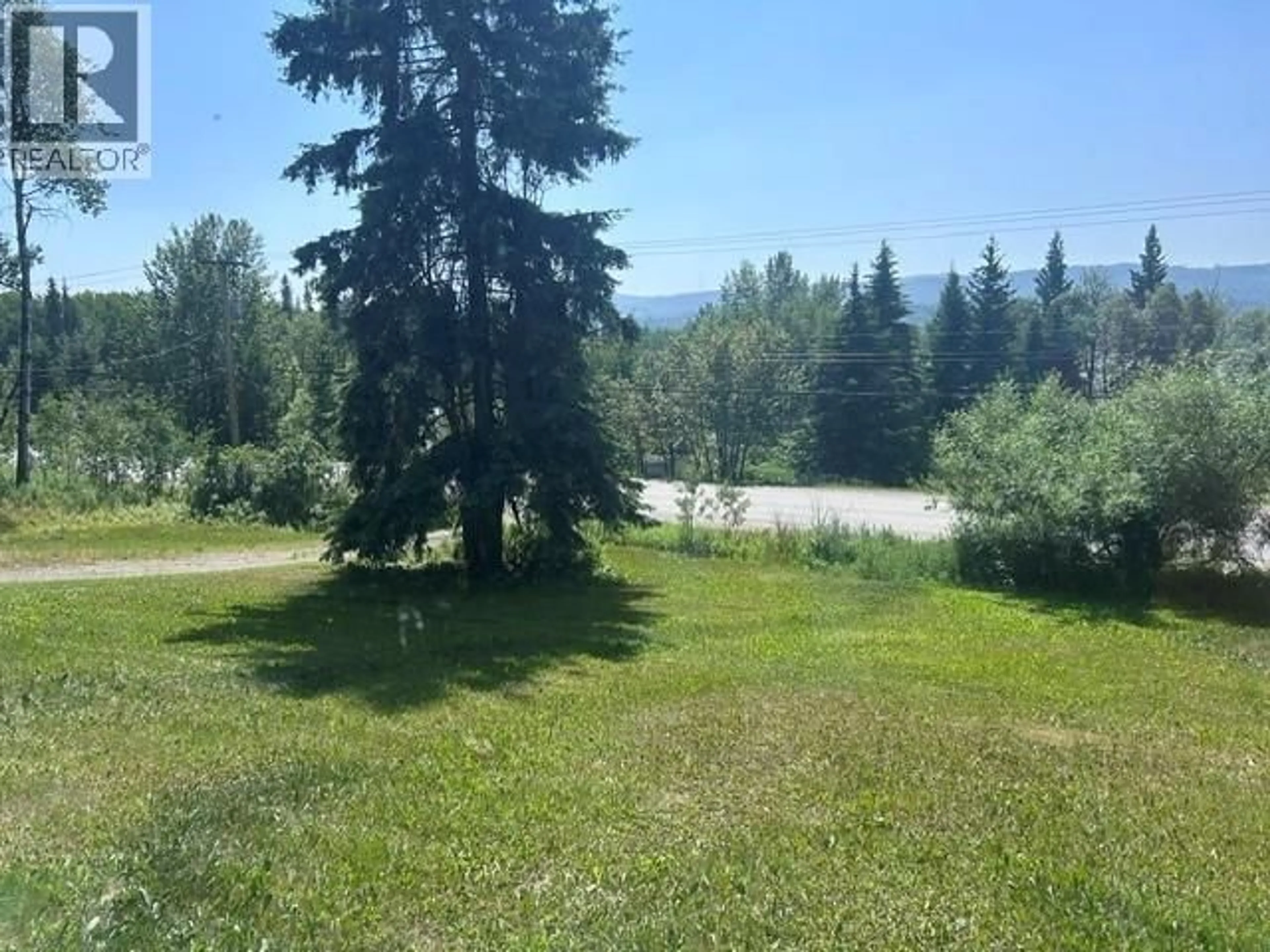 A pic from outside/outdoor area/front of a property/back of a property/a pic from drone, forest/trees view for 10370 16 HIGHWAY, Burns Lake British Columbia V0J1E1