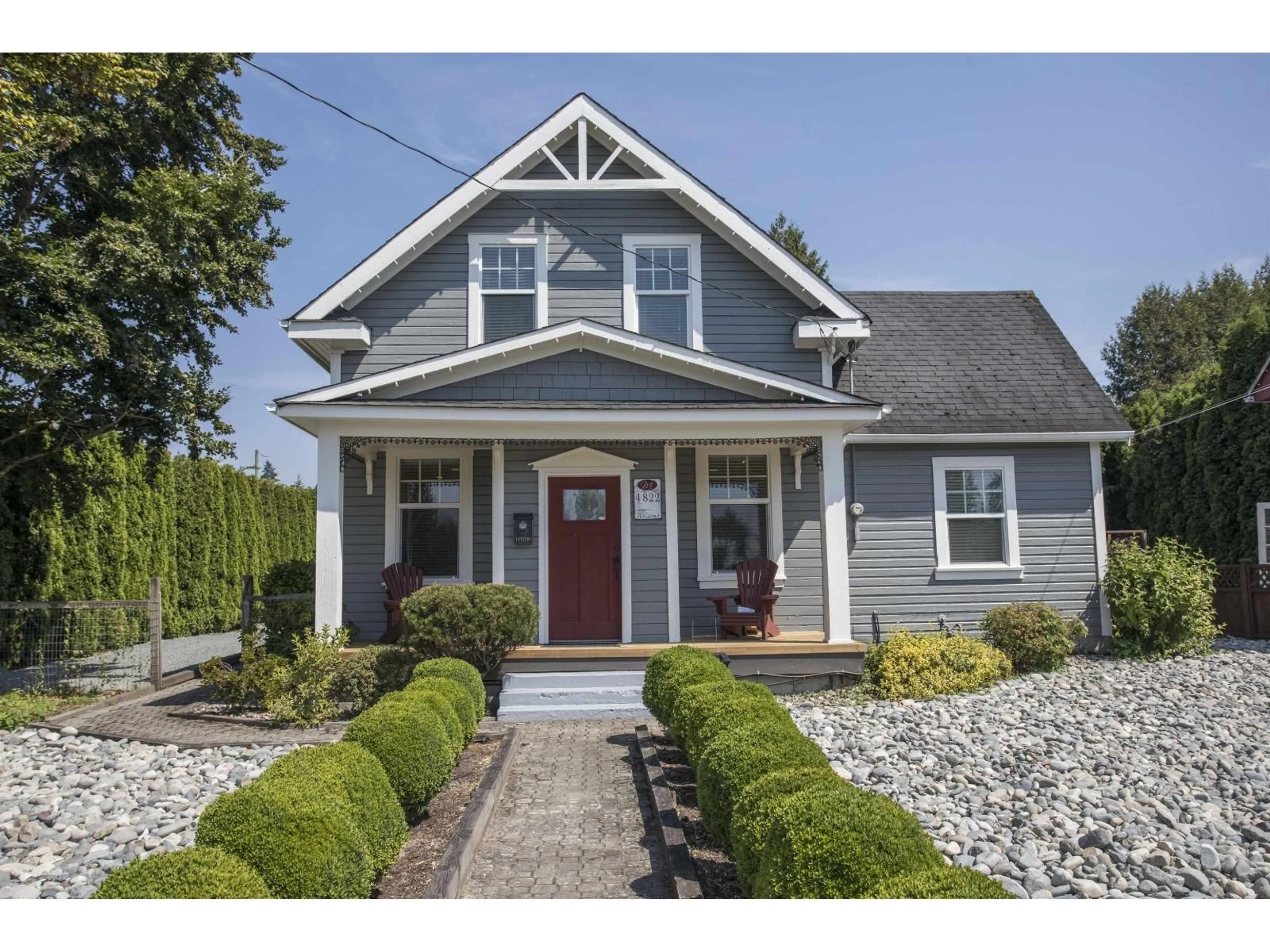Home with vinyl exterior material, street for 4822 216 STREET, Langley British Columbia V3A2M7
