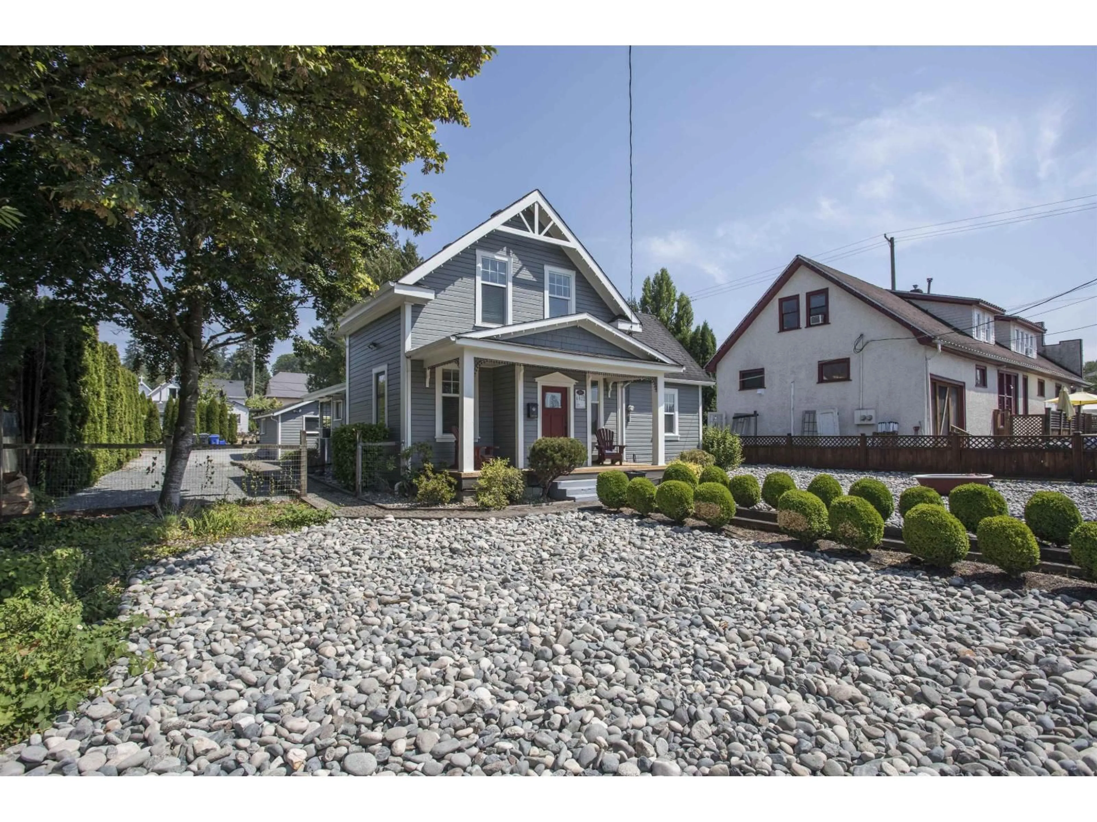 Home with vinyl exterior material, street for 4822 216 STREET, Langley British Columbia V3A2M7