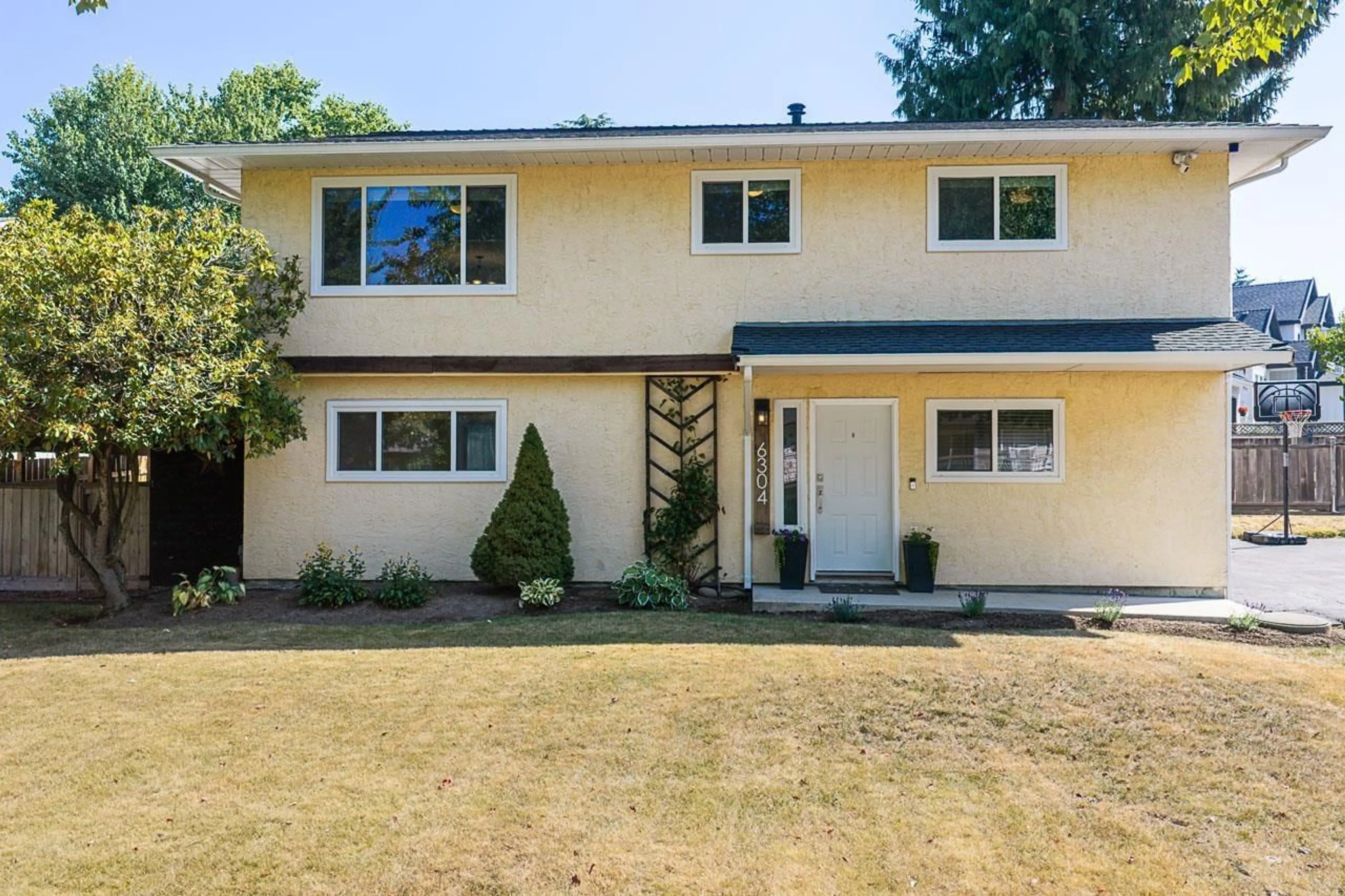 Home with vinyl exterior material, street for 6304 SUNDANCE DRIVE, Surrey British Columbia V3S8A9