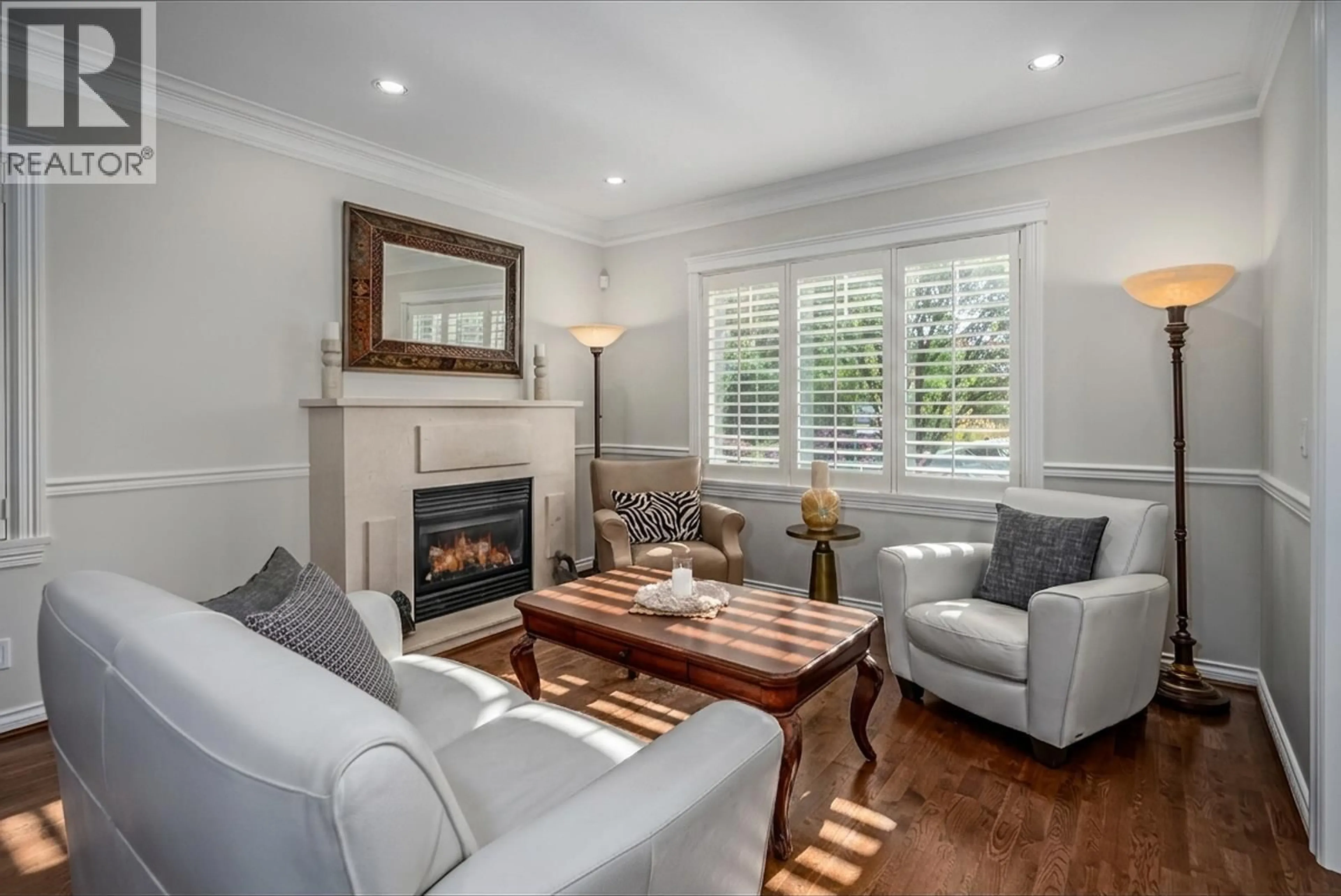 Living room with furniture, wood/laminate floor for 5379 WELLBURN DRIVE, Delta British Columbia V4K2H8