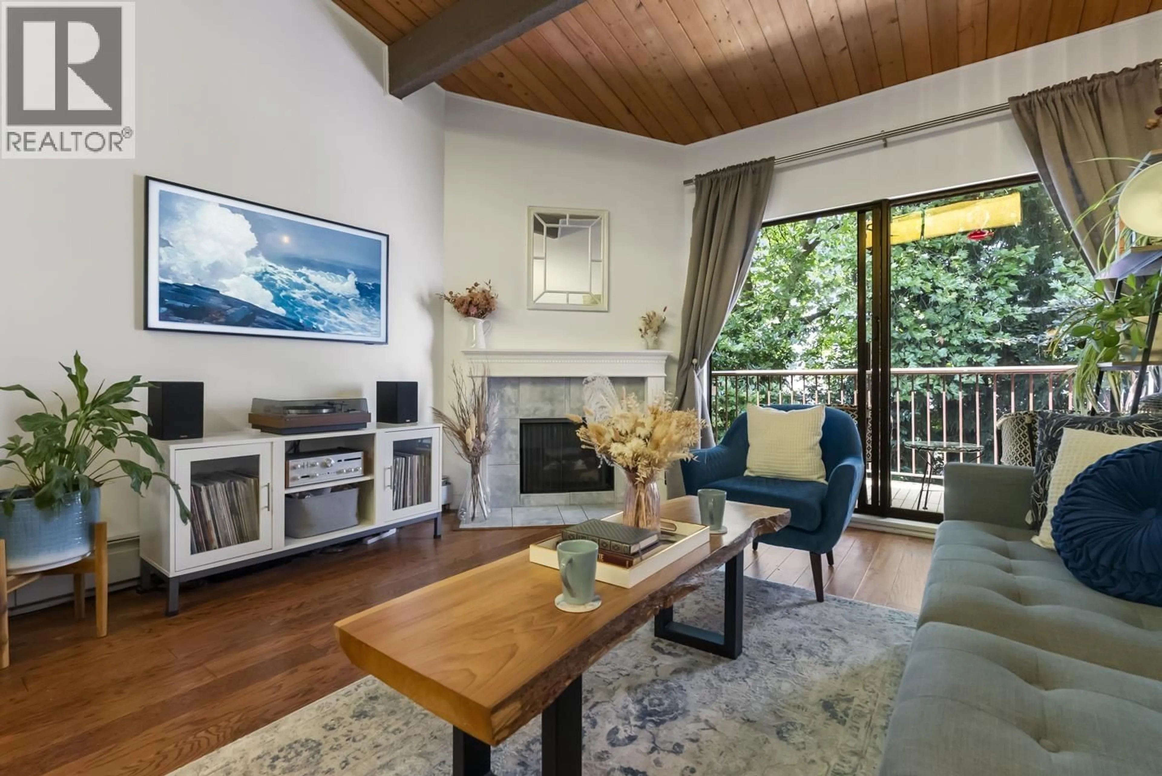 Living room with furniture, wood/laminate floor for 311 - 9101 HORNE STREET, Burnaby British Columbia V3N4M3