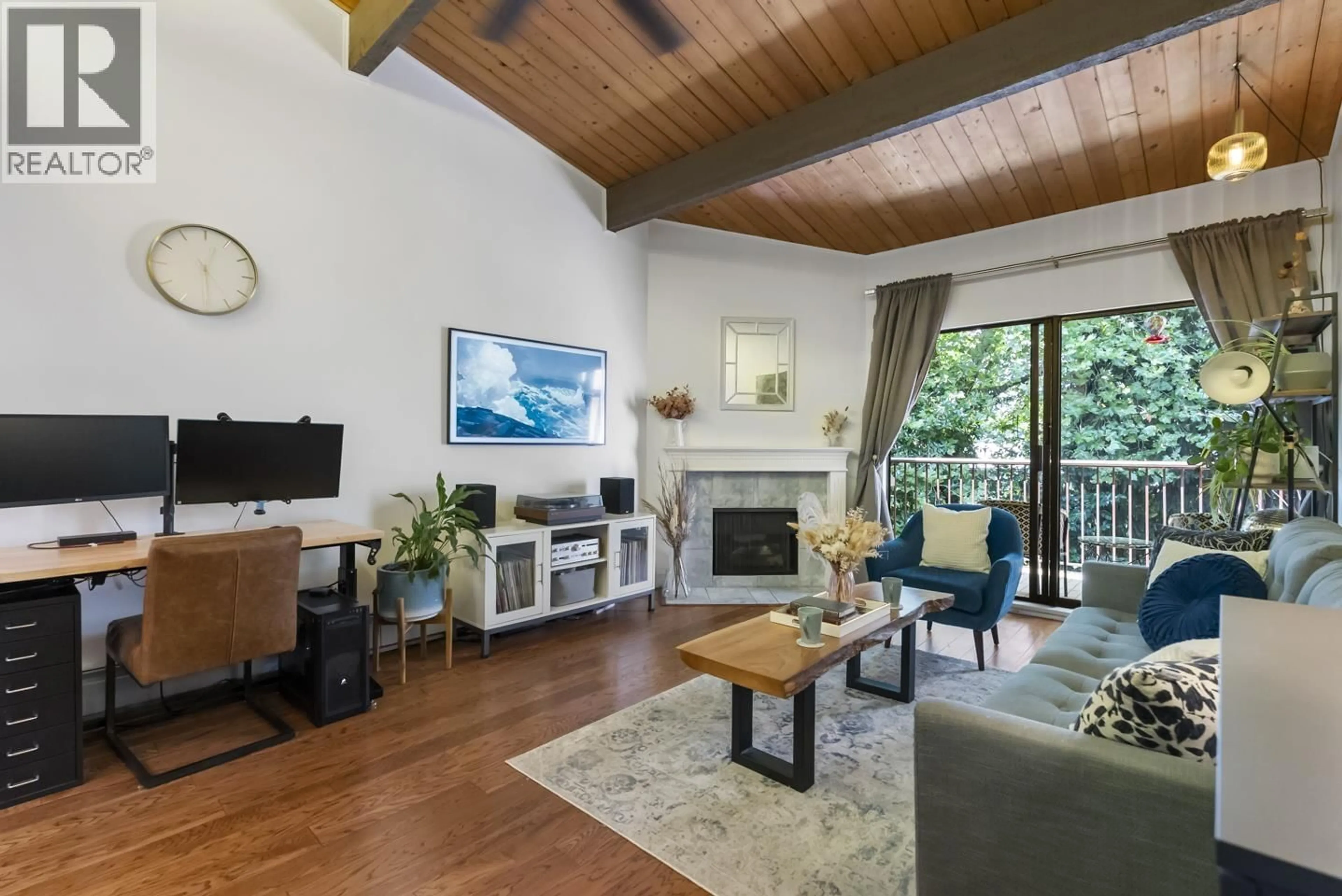 Living room with furniture, wood/laminate floor for 311 - 9101 HORNE STREET, Burnaby British Columbia V3N4M3
