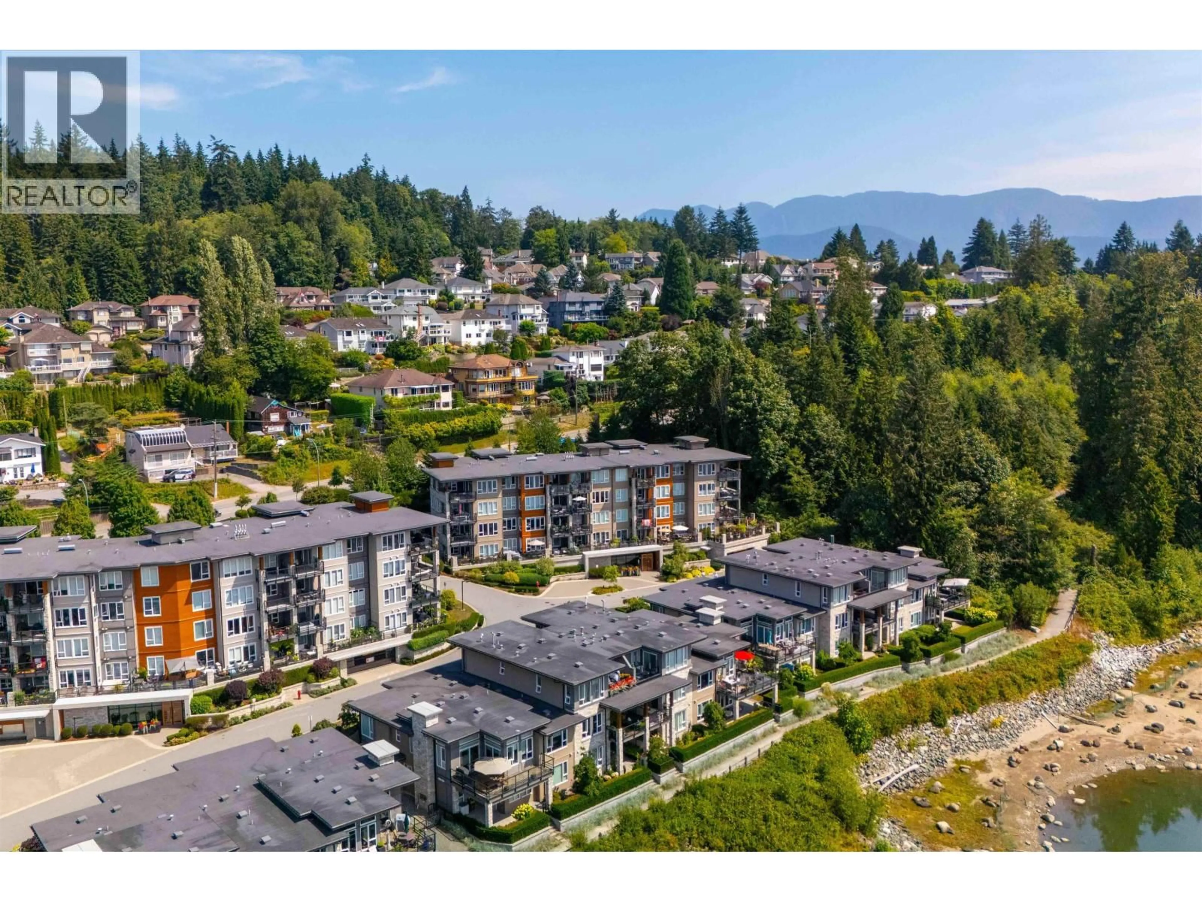 A pic from outside/outdoor area/front of a property/back of a property/a pic from drone, mountain view for 203 - 3911 CATES LANDING WAY, North Vancouver British Columbia V7G0A6