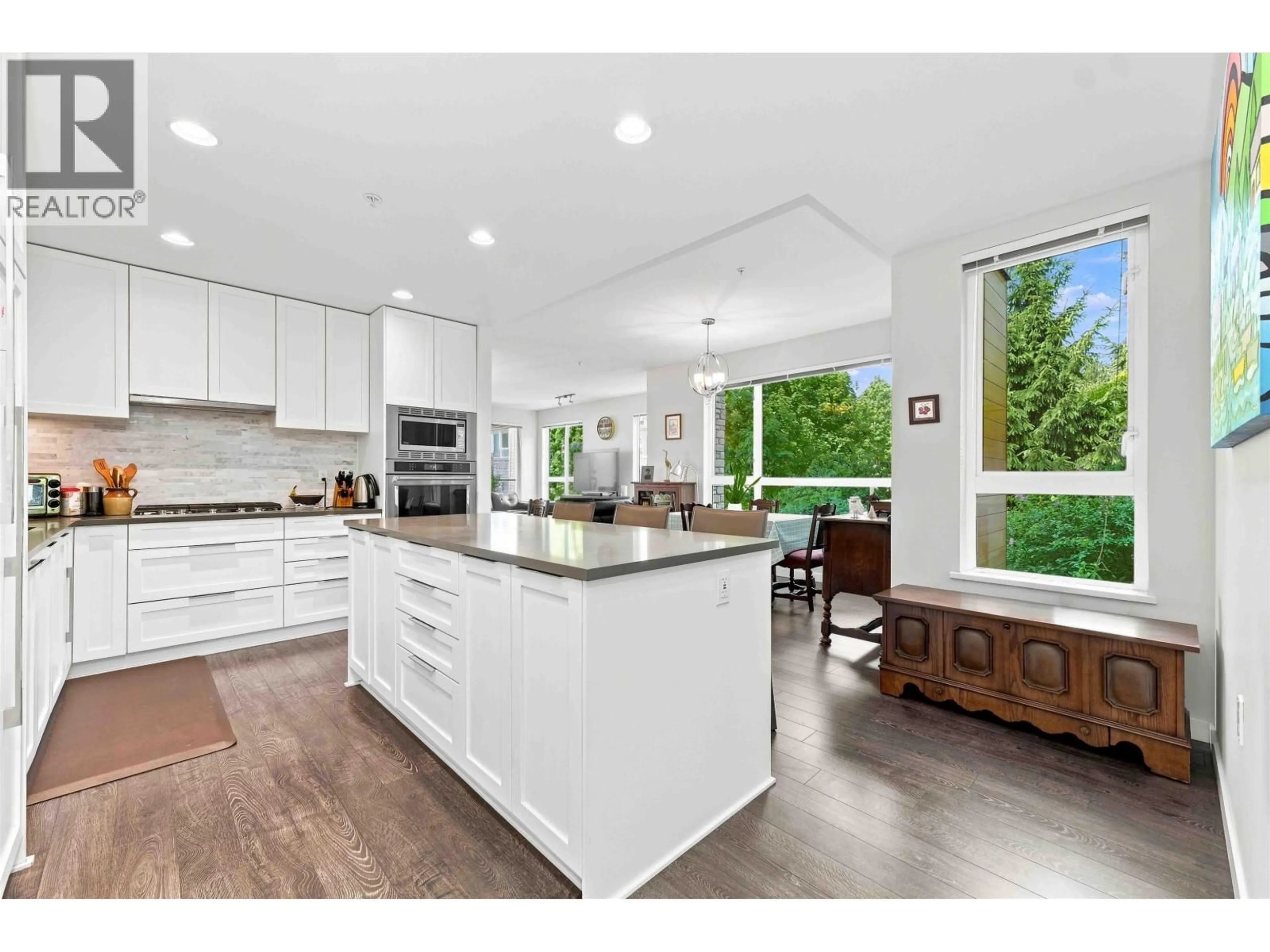 Open concept kitchen, unknown for 203 - 3911 CATES LANDING WAY, North Vancouver British Columbia V7G0A6