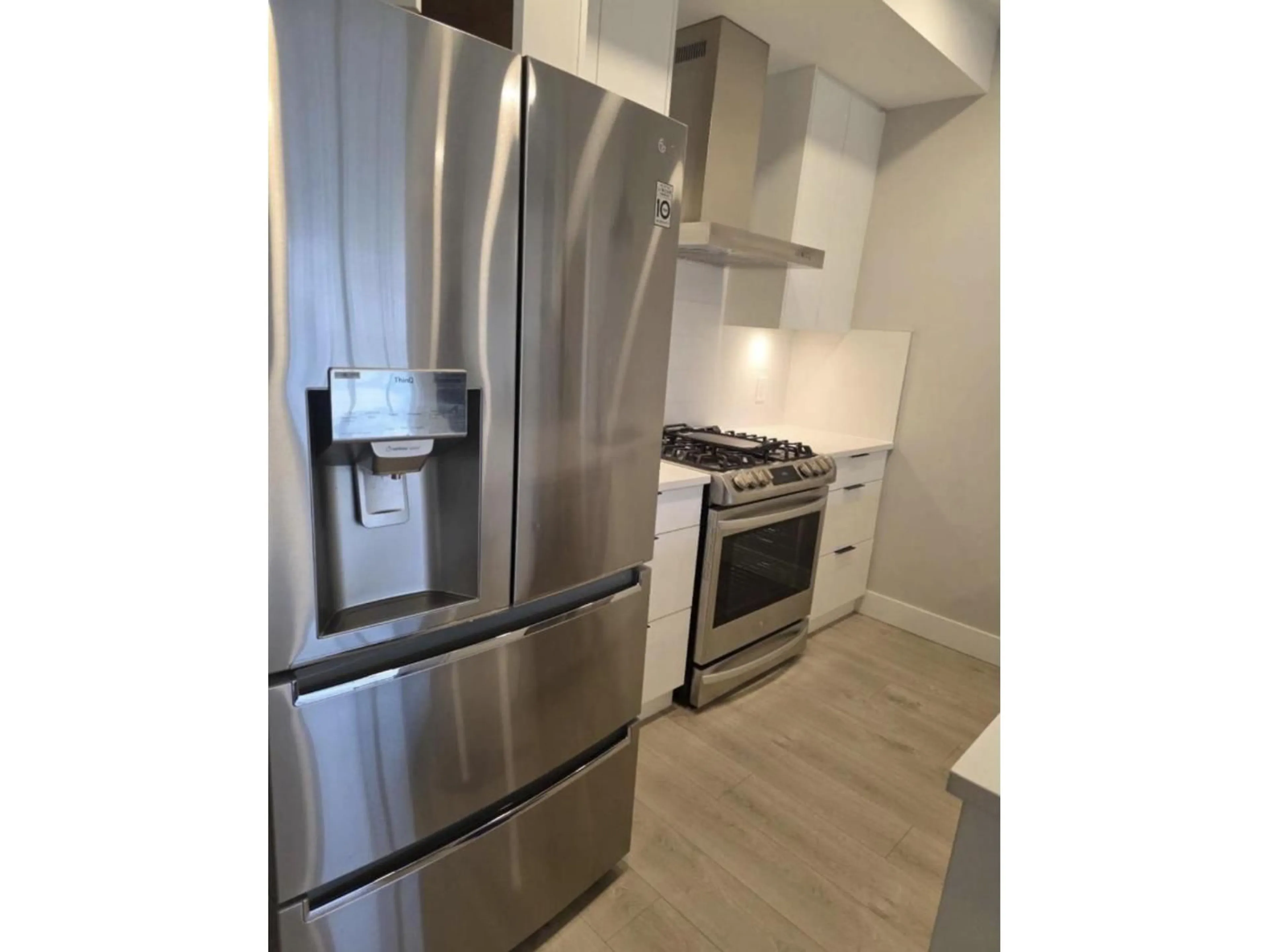Standard kitchen, wood/laminate floor for 211 - 14818 60 AVENUE, Surrey British Columbia V3S1R9