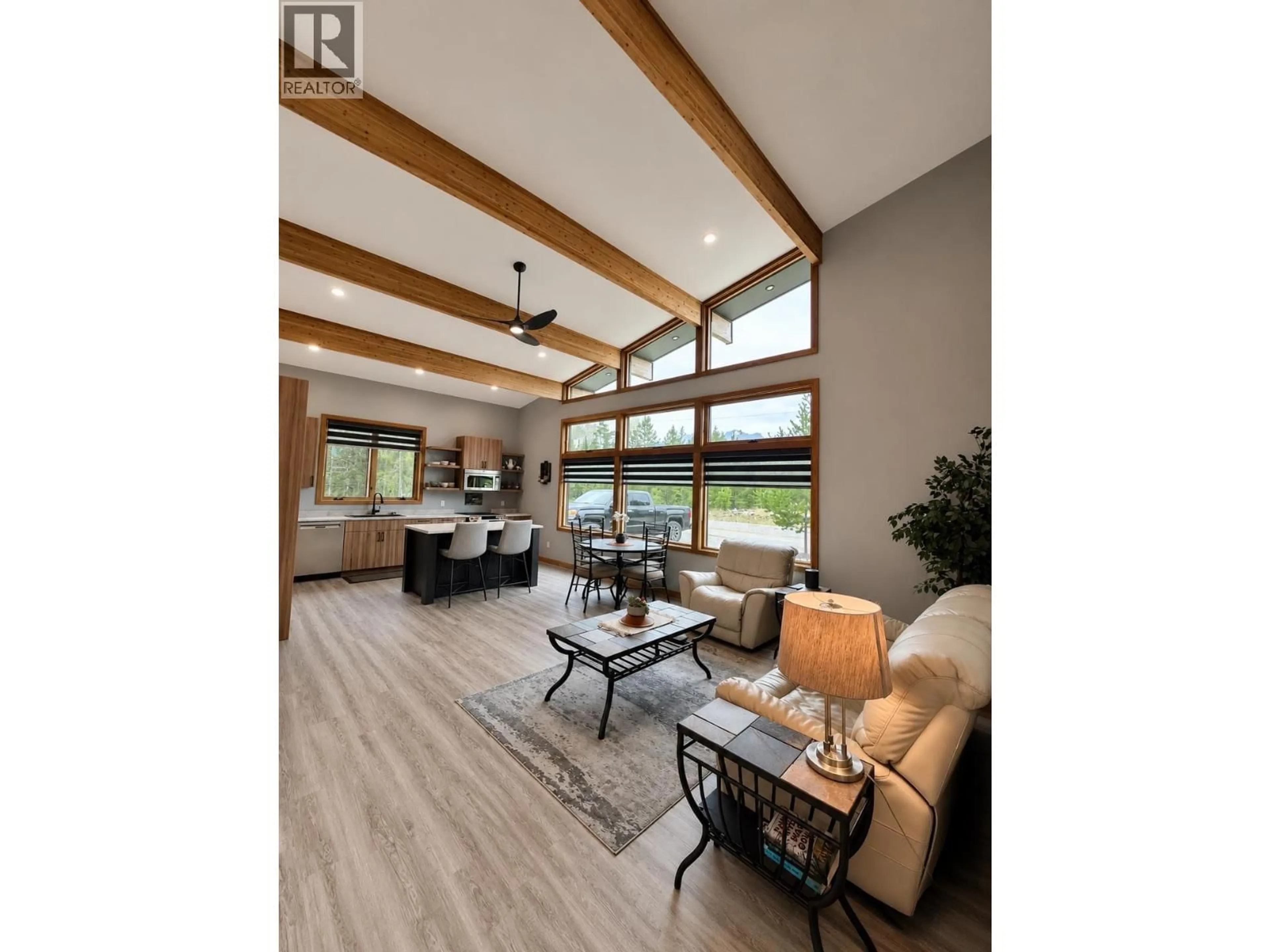 Living room with furniture, wood/laminate floor for 209 DOGWOOD STREET, Valemount British Columbia V0E2Z0