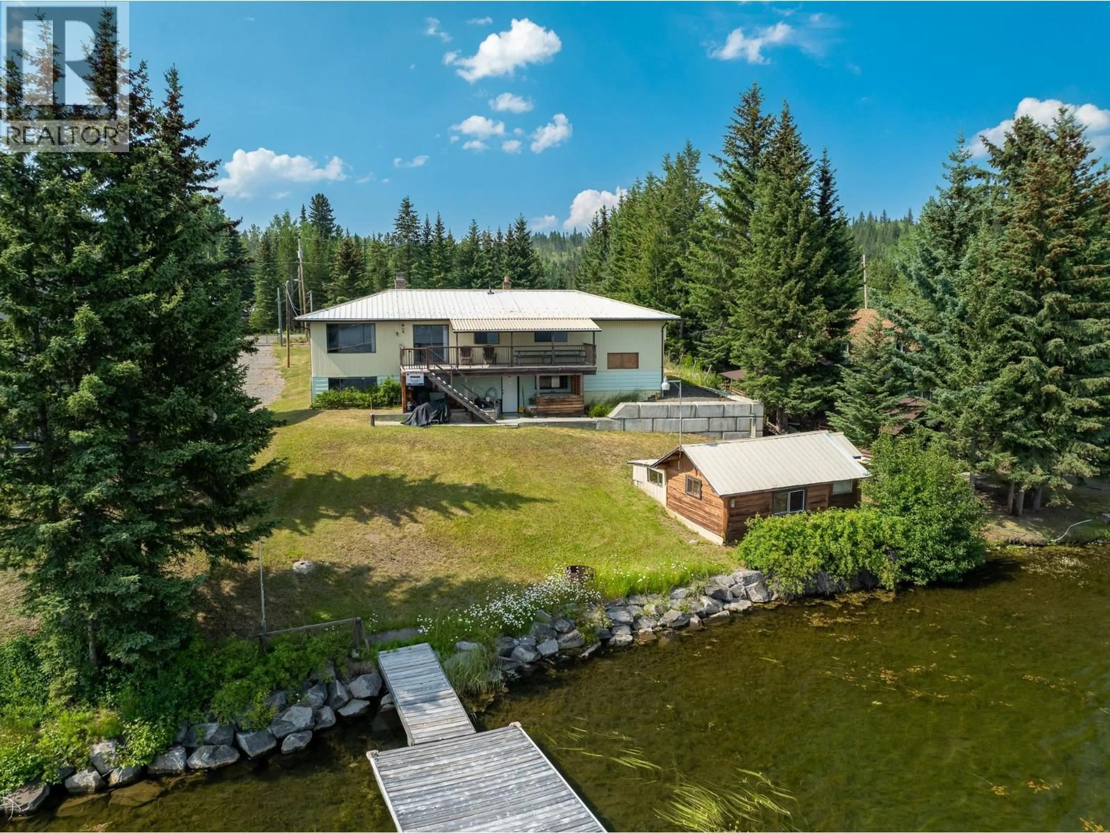A pic from outside/outdoor area/front of a property/back of a property/a pic from drone, water/lake/river/ocean view for 7568 BURGESS ROAD, Deka Lake / Sulphurous / Hathaway Lakes British Columbia V0K1X3