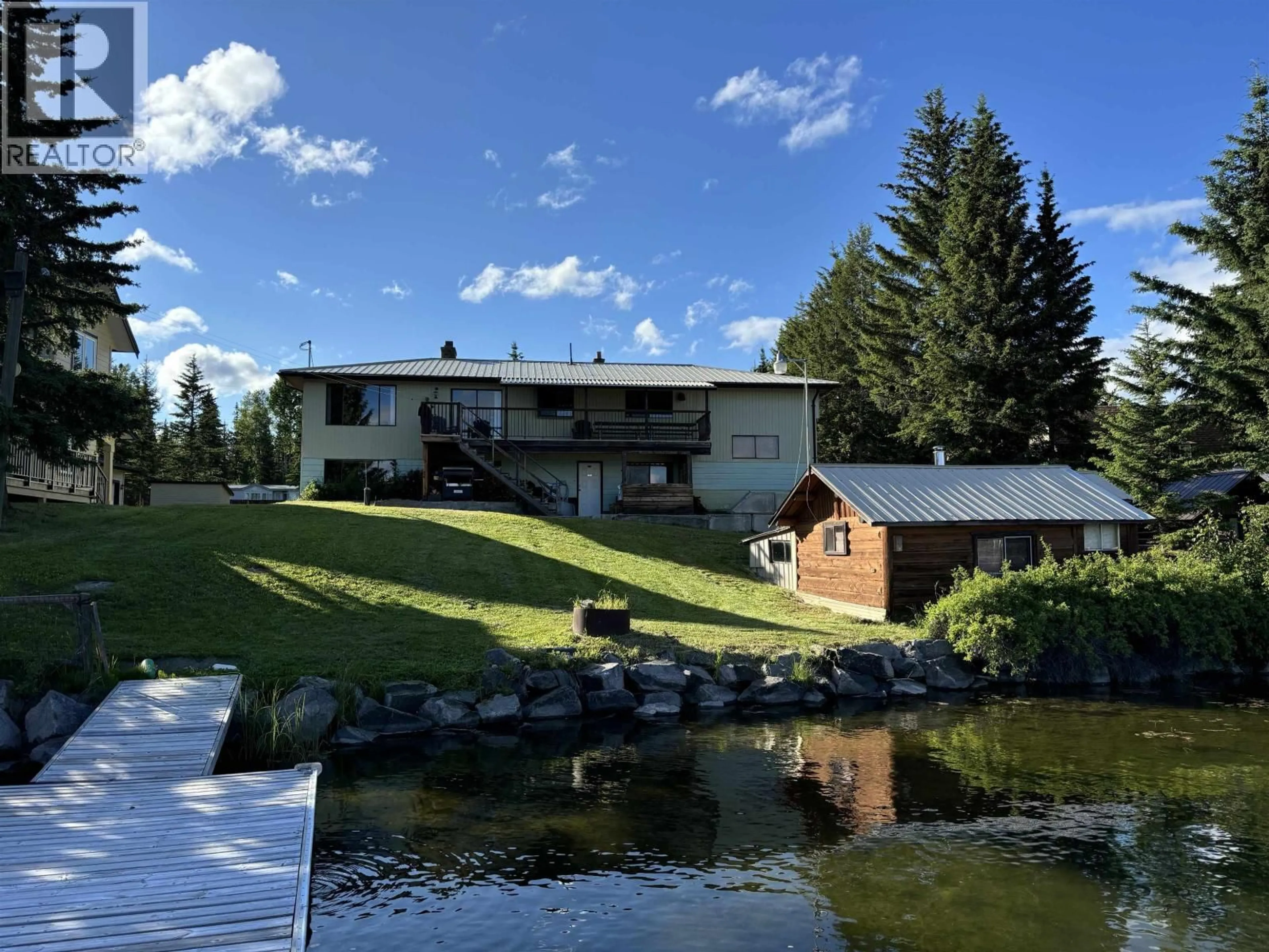 A pic from outside/outdoor area/front of a property/back of a property/a pic from drone, water/lake/river/ocean view for 7568 BURGESS ROAD, Deka Lake / Sulphurous / Hathaway Lakes British Columbia V0K1X3
