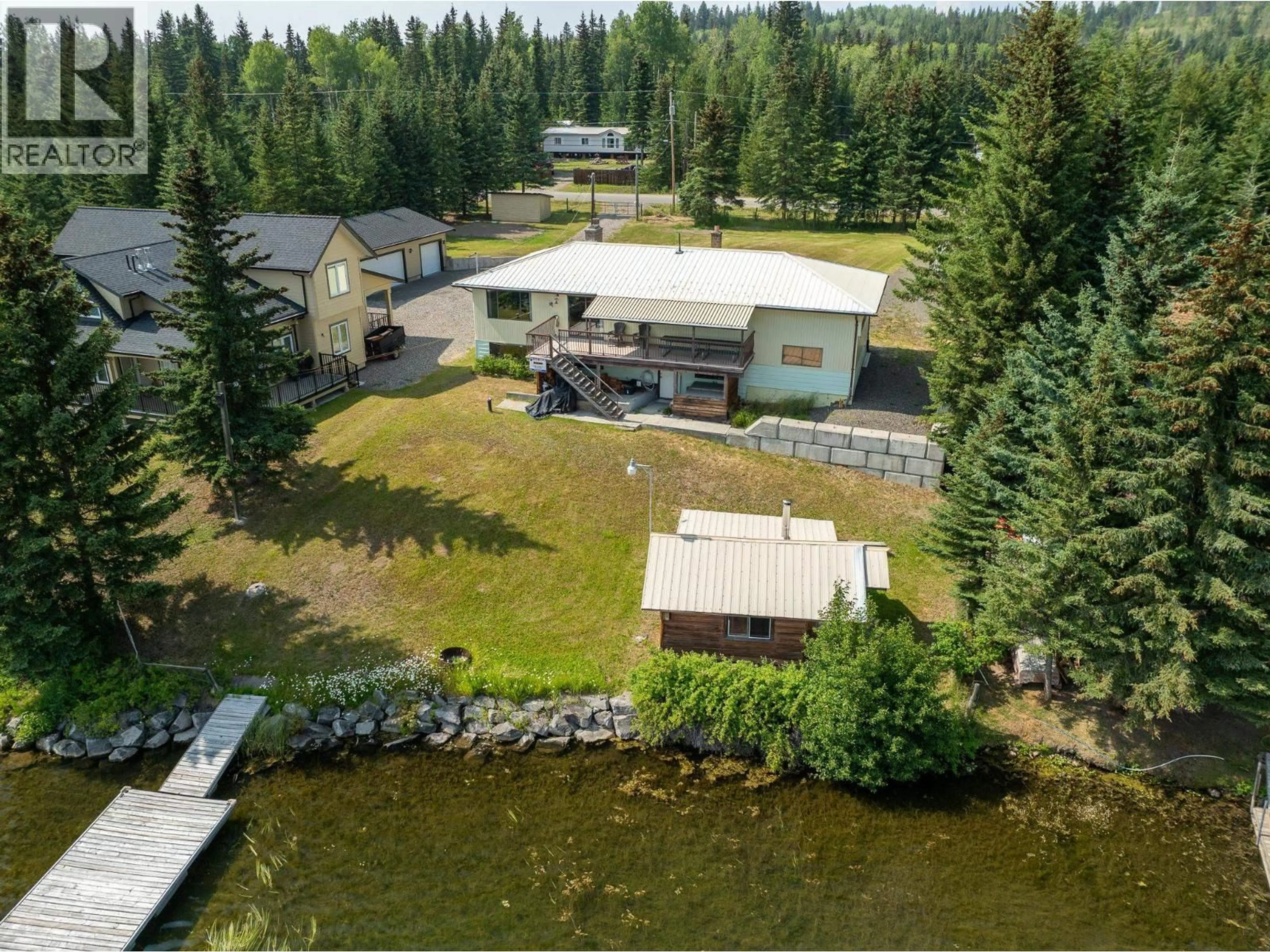 A pic from outside/outdoor area/front of a property/back of a property/a pic from drone, water/lake/river/ocean view for 7568 BURGESS ROAD, Deka Lake / Sulphurous / Hathaway Lakes British Columbia V0K1X3