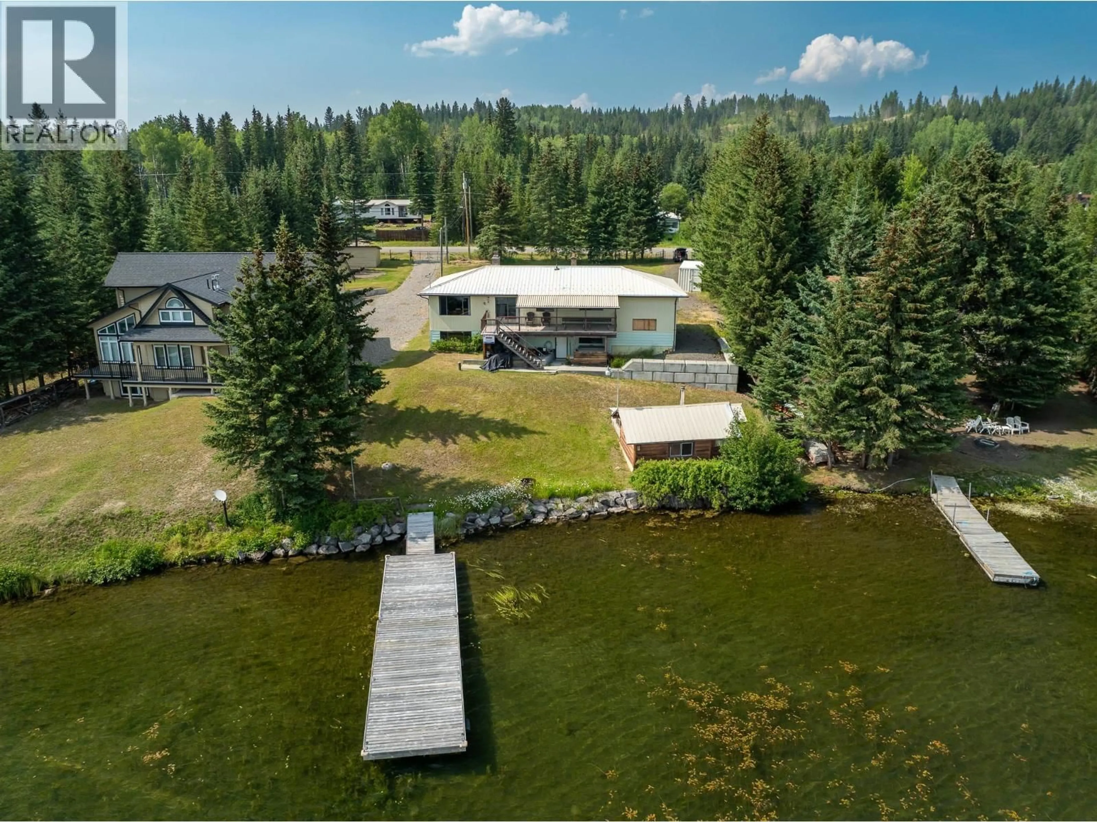 A pic from outside/outdoor area/front of a property/back of a property/a pic from drone, water/lake/river/ocean view for 7568 BURGESS ROAD, Deka Lake / Sulphurous / Hathaway Lakes British Columbia V0K1X3