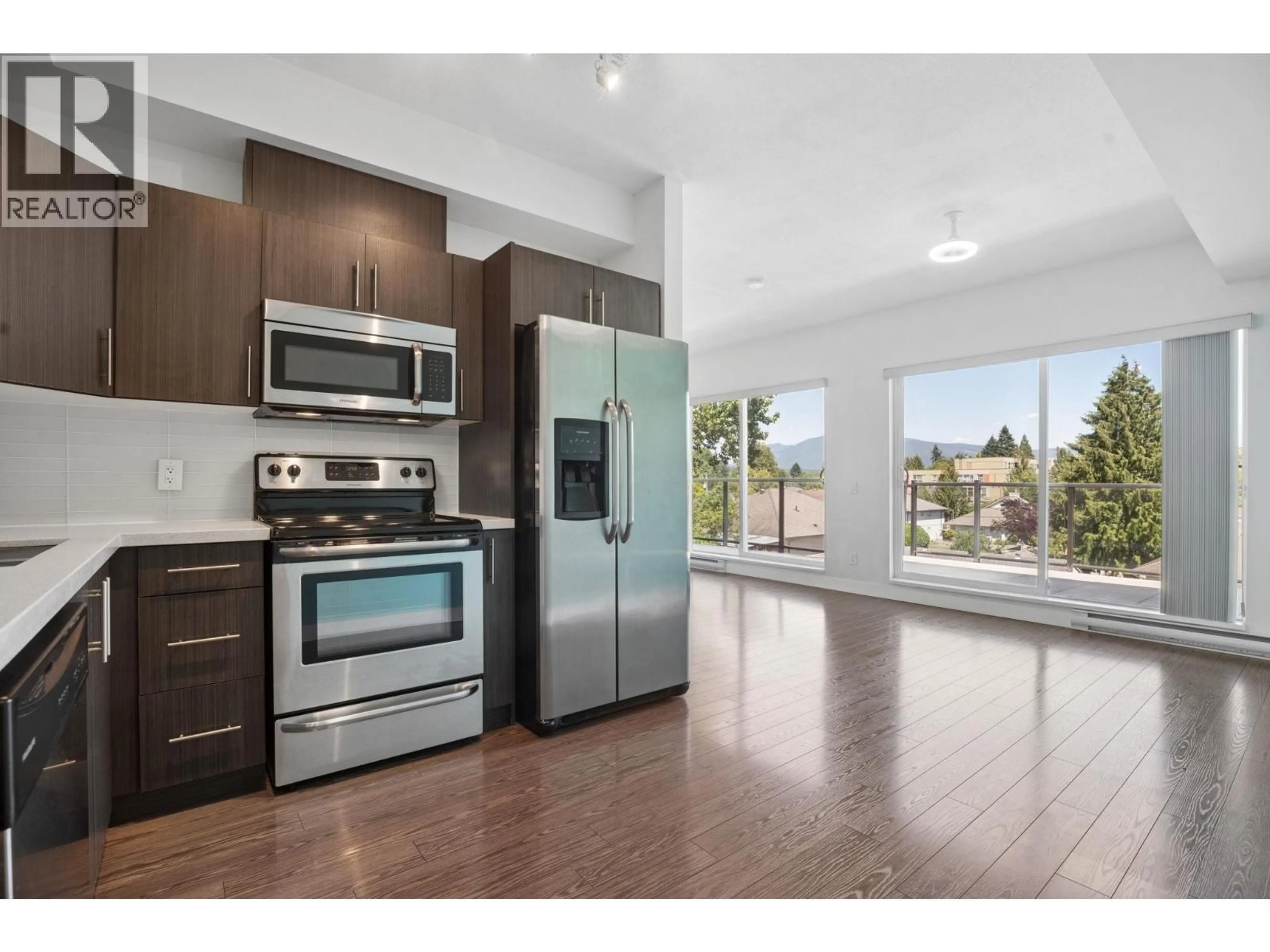 Open concept kitchen, wood/laminate floor for 402 - 12070 227 STREET, Maple Ridge British Columbia V2X9H2