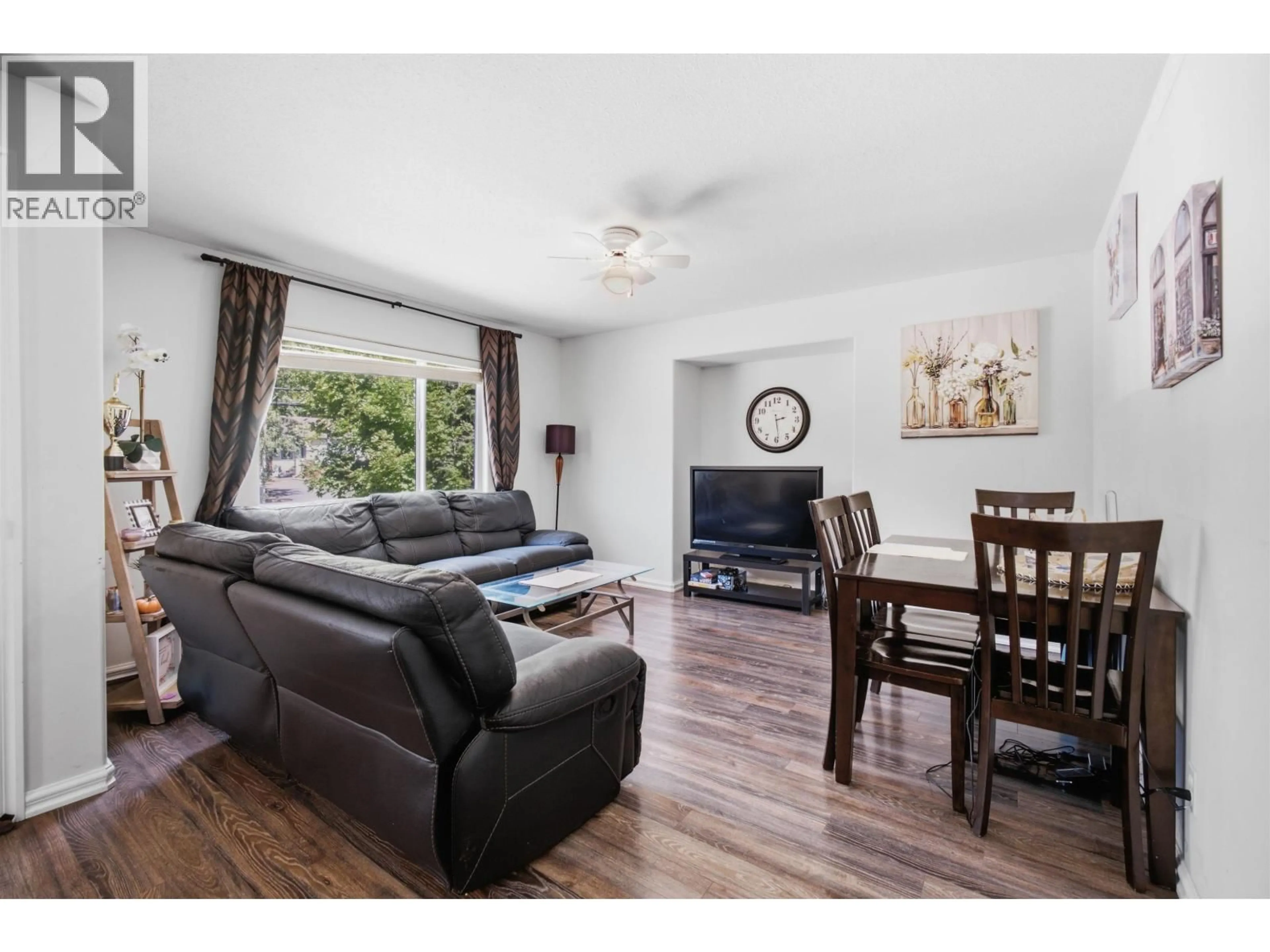 Living room with furniture, wood/laminate floor for 4449 PARK AVENUE, Terrace British Columbia V8G1T8