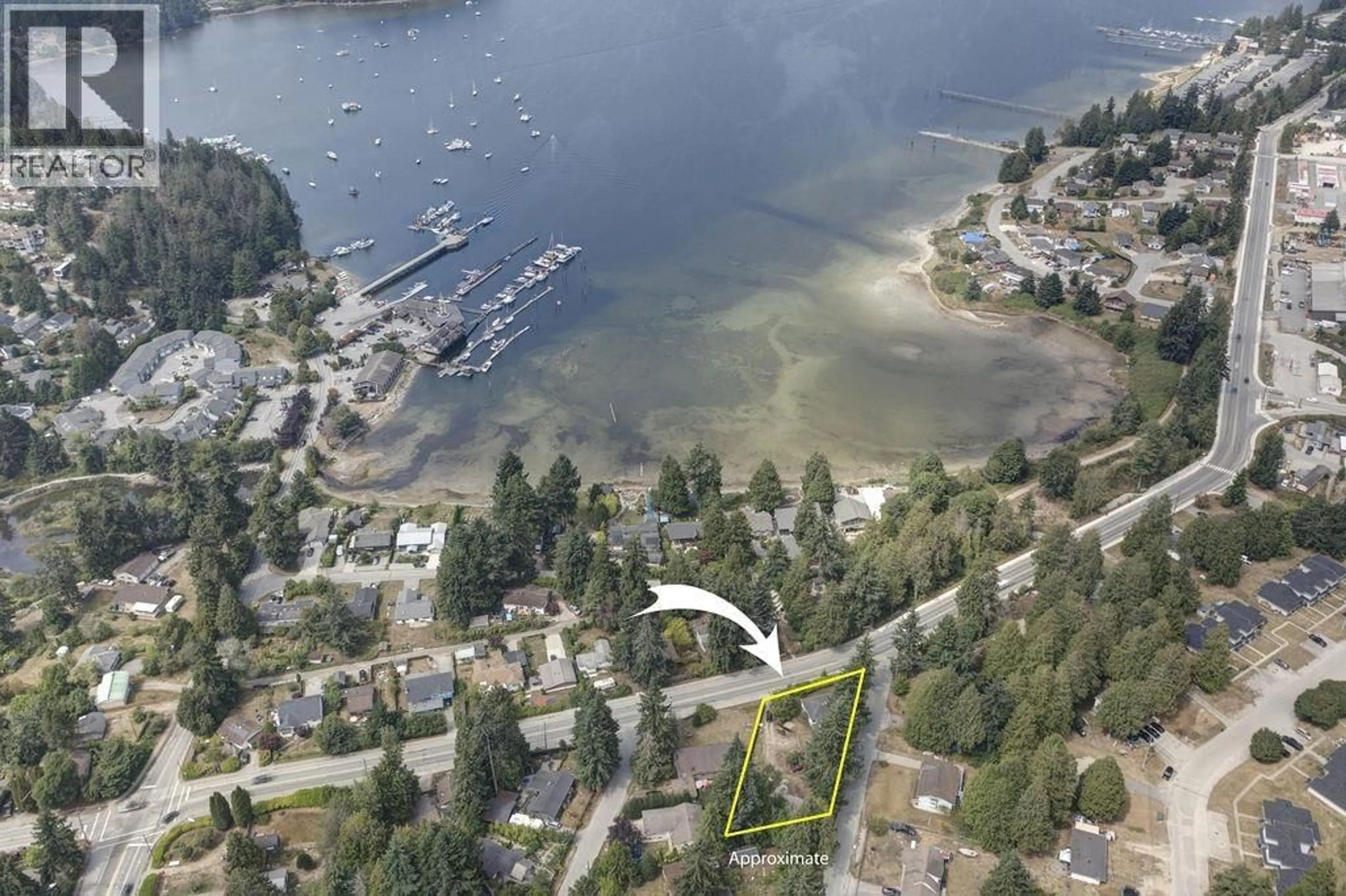 A pic from outside/outdoor area/front of a property/back of a property/a pic from drone, water/lake/river/ocean view for 5724 PORPOISE BAY ROAD, Sechelt British Columbia V0N3A3