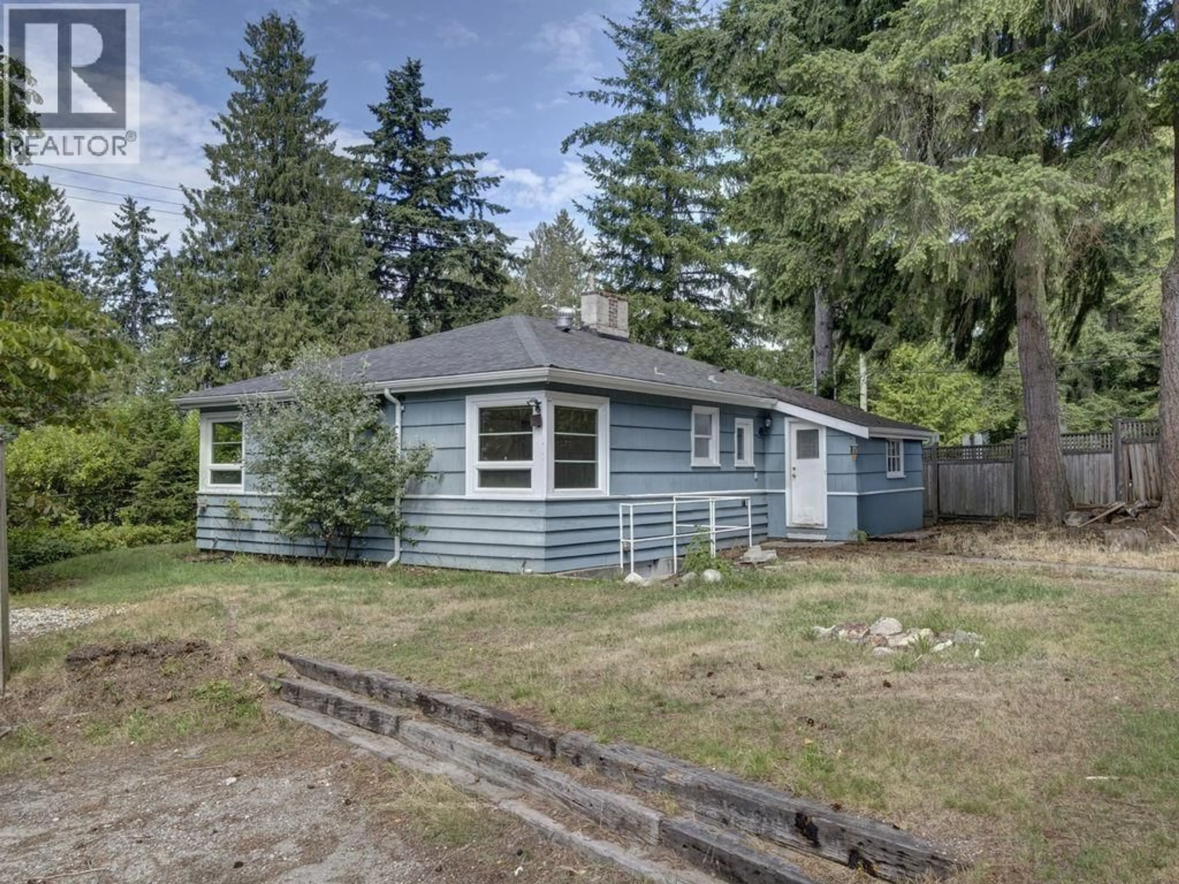 Home with vinyl exterior material, street for 5724 PORPOISE BAY ROAD, Sechelt British Columbia V0N3A3