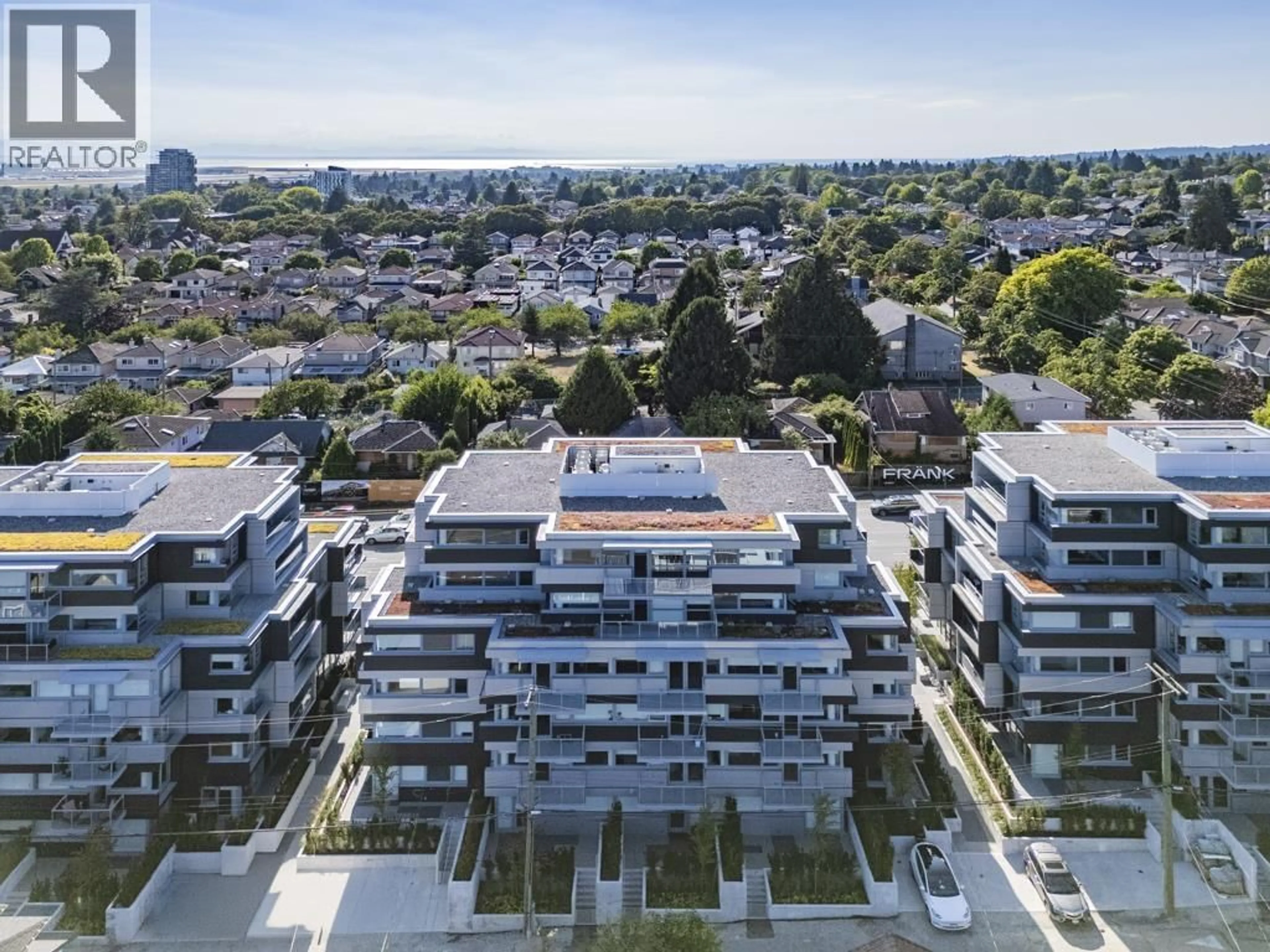 A pic from outside/outdoor area/front of a property/back of a property/a pic from drone, city buildings view from balcony for 106 - 8080 OAK STREET, Vancouver British Columbia V6P0N1