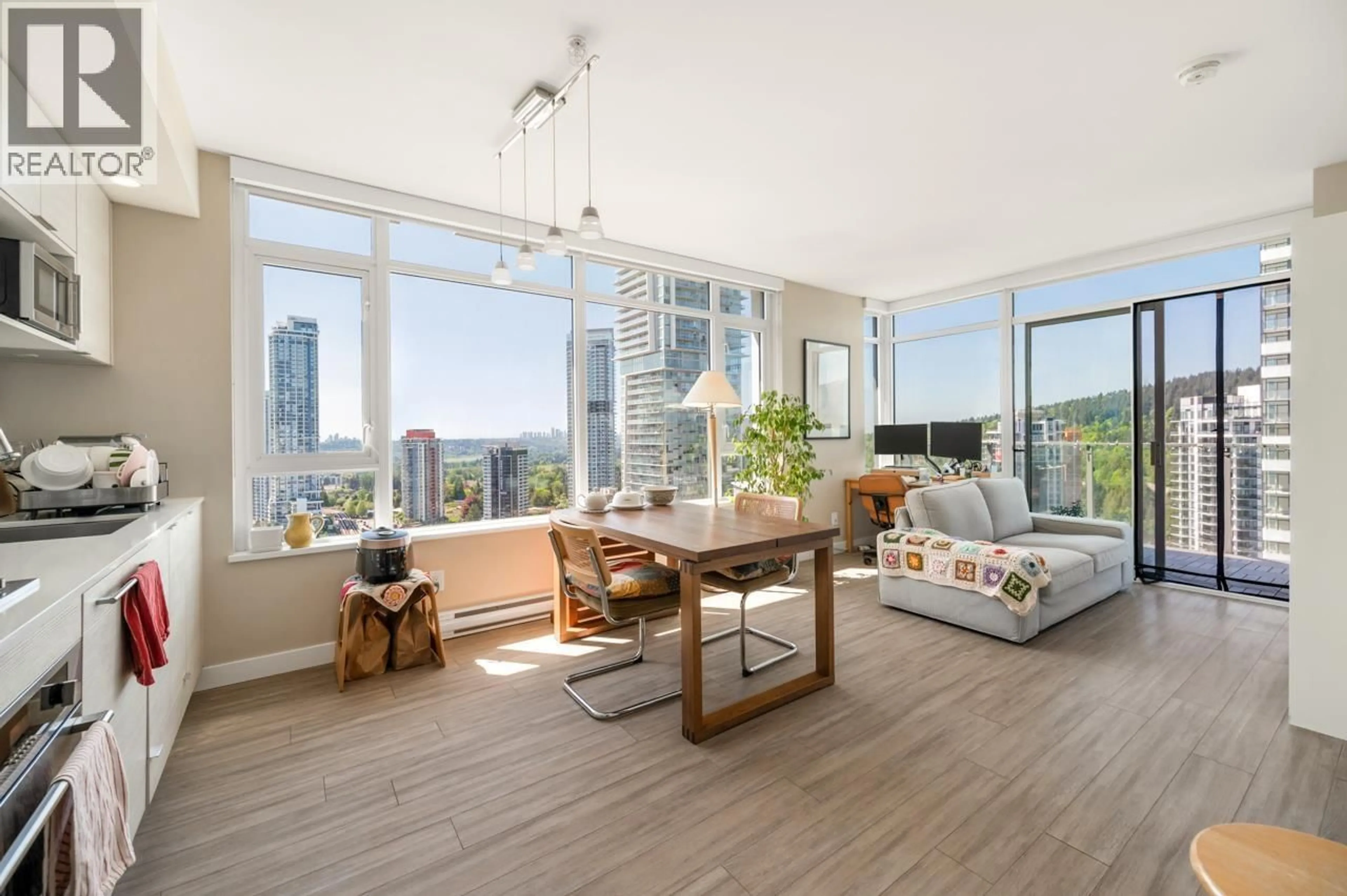 Living room with furniture, wood/laminate floor for 2607 - 602 COMO LAKE AVENUE, Coquitlam British Columbia V3J0G2