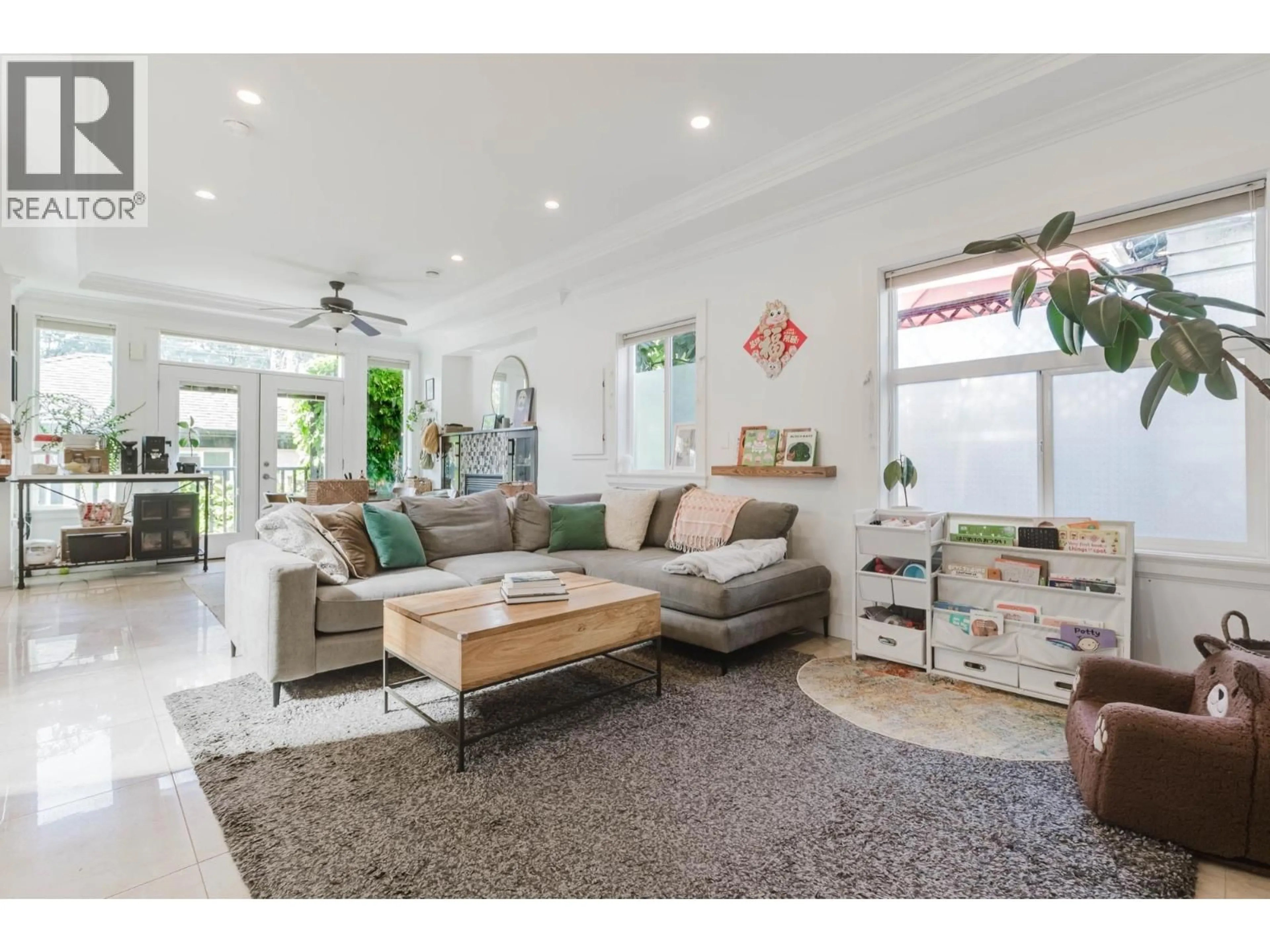Living room with furniture, ceramic/tile floor for 2018 12TH AVENUE, Vancouver British Columbia V5N2A8