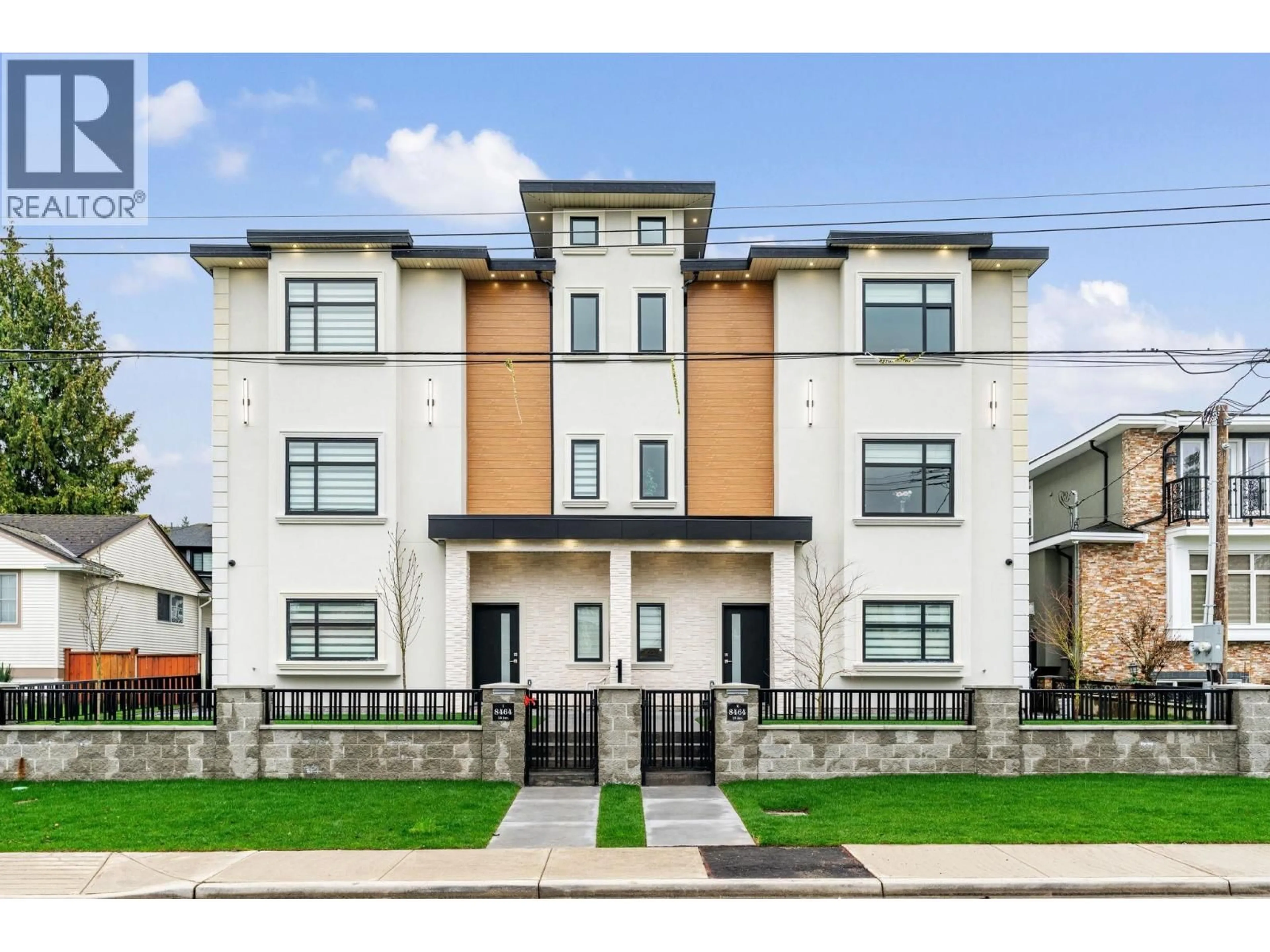 Home with brick exterior material, street for 2 - 8464 15 AVENUE, Burnaby British Columbia V3N1Y2