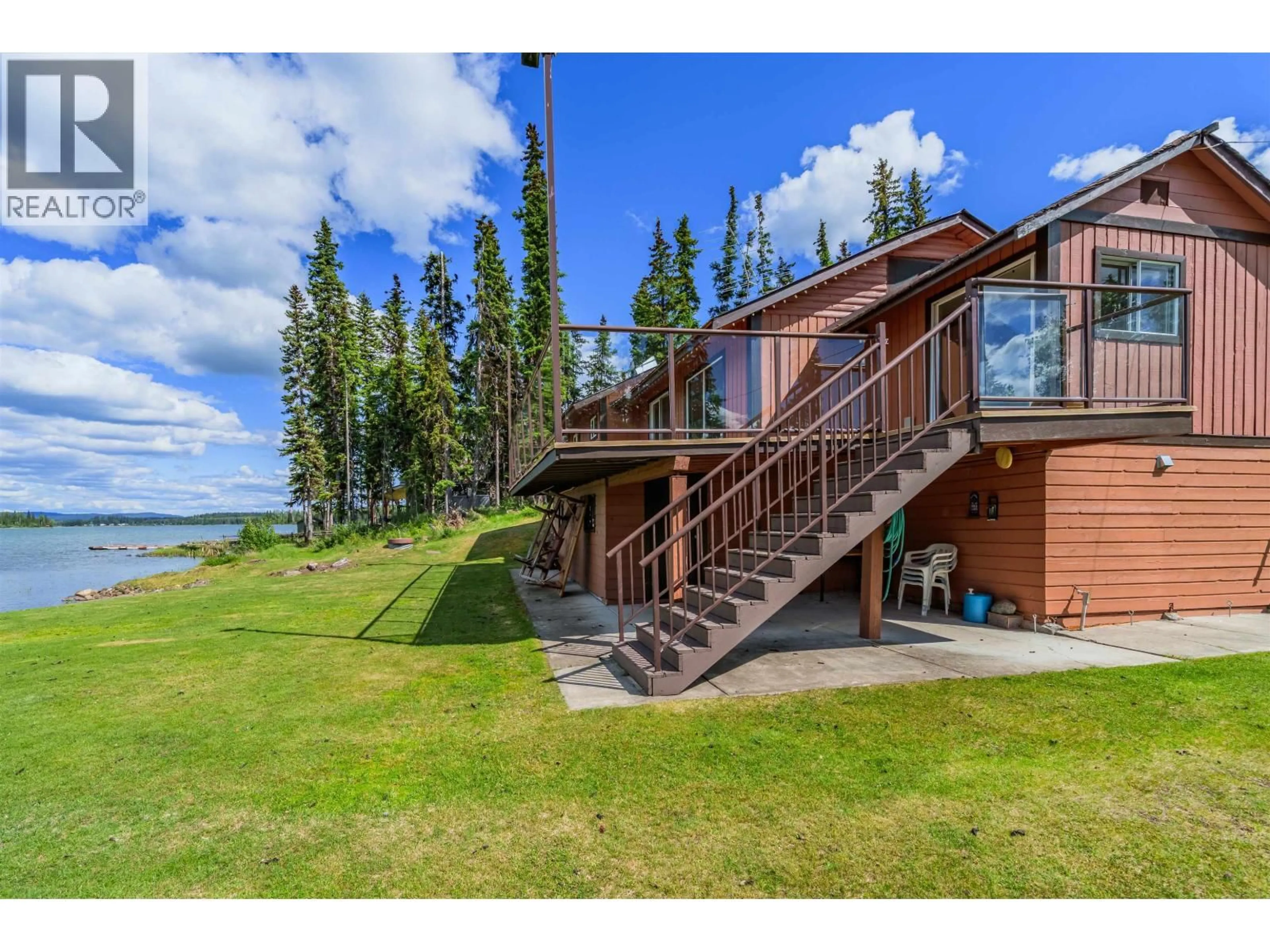 A pic from outside/outdoor area/front of a property/back of a property/a pic from drone, water/lake/river/ocean view for 7177 NATH ROAD, Sheridan Lake British Columbia V0K1X1