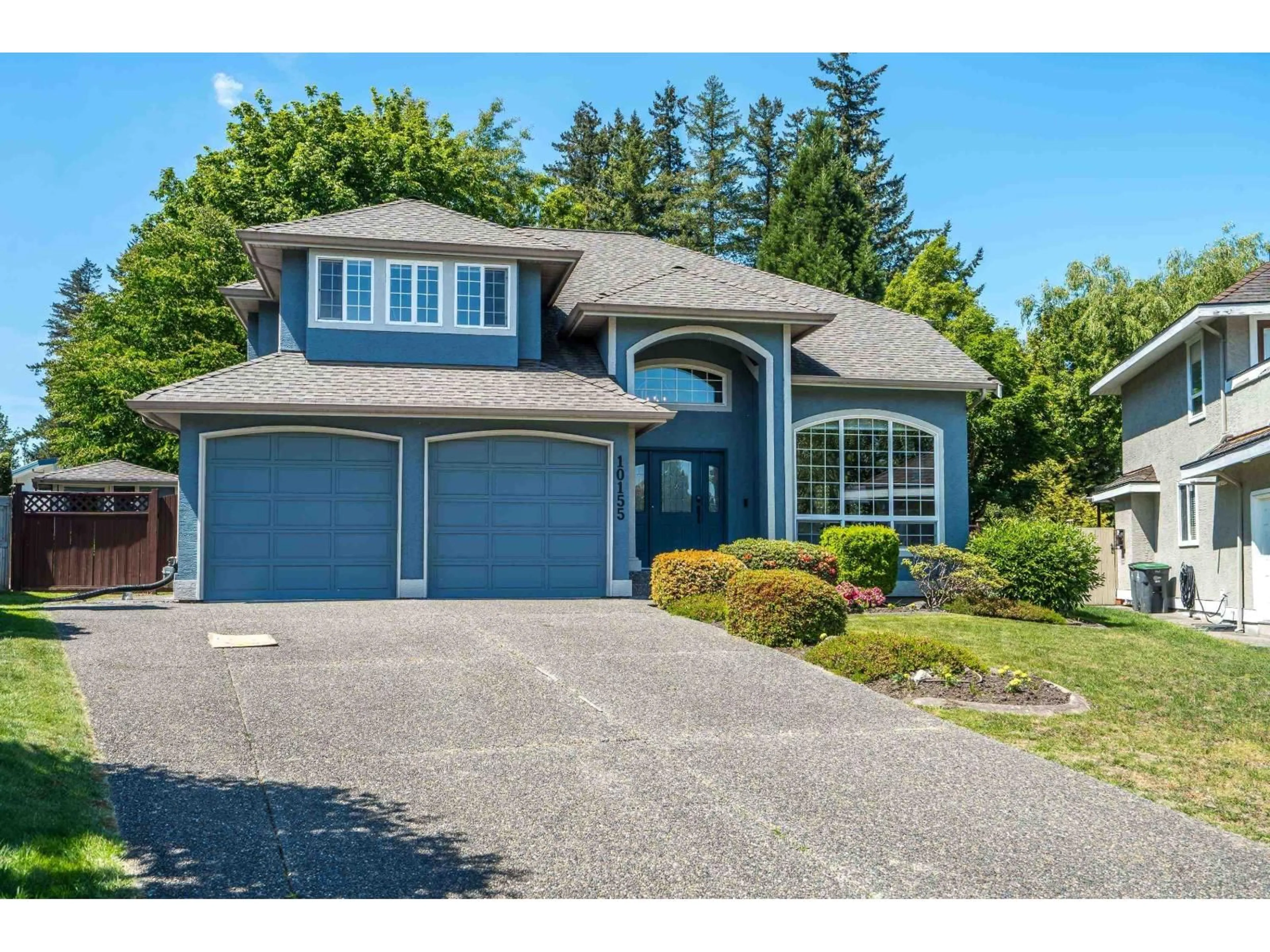 Home with vinyl exterior material, street for 10155 171A STREET, Surrey British Columbia V4N3L3