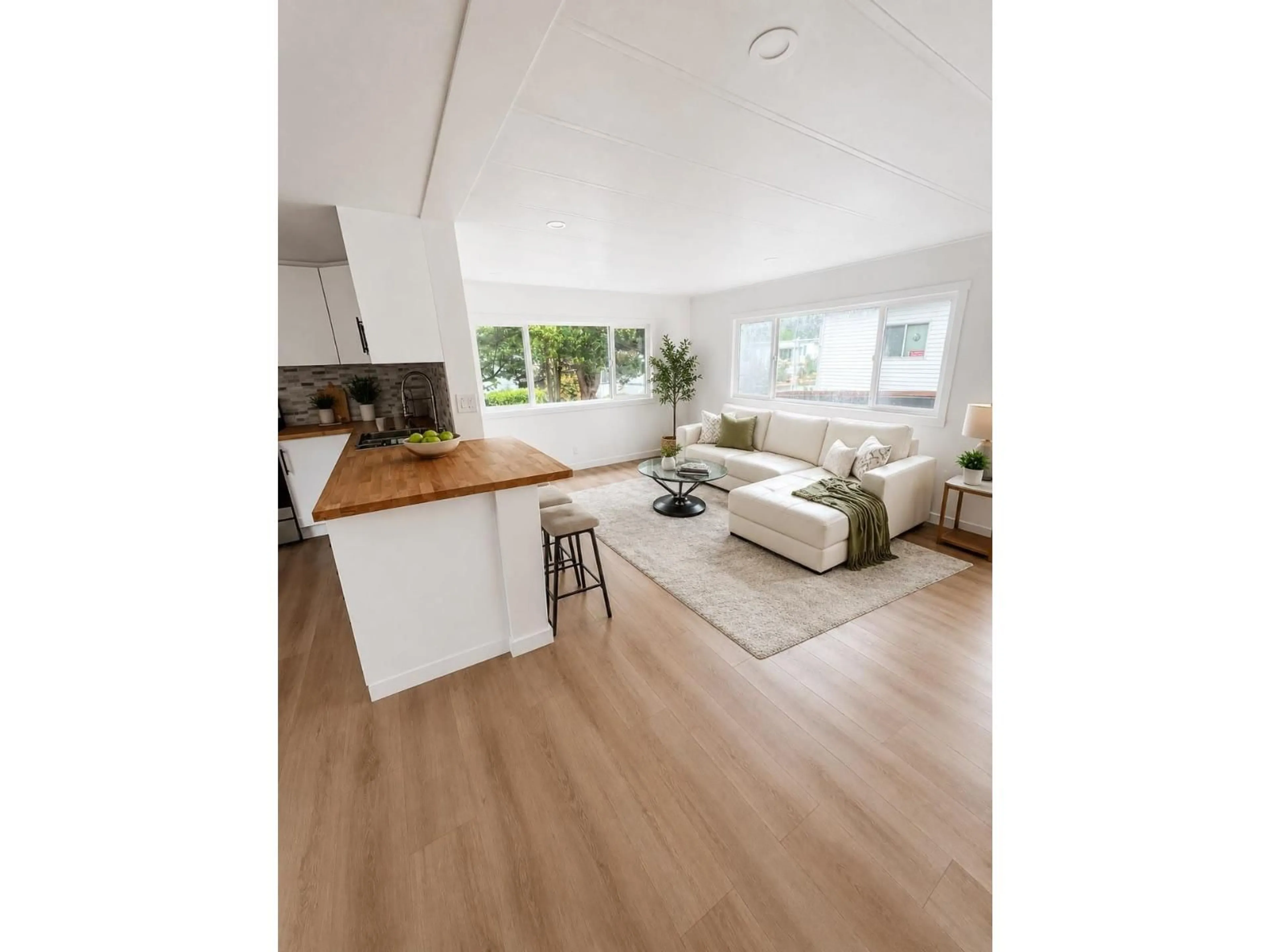 Open concept kitchen, wood/laminate floor for 19 - 13650 80 AVENUE, Surrey British Columbia V3W6J8