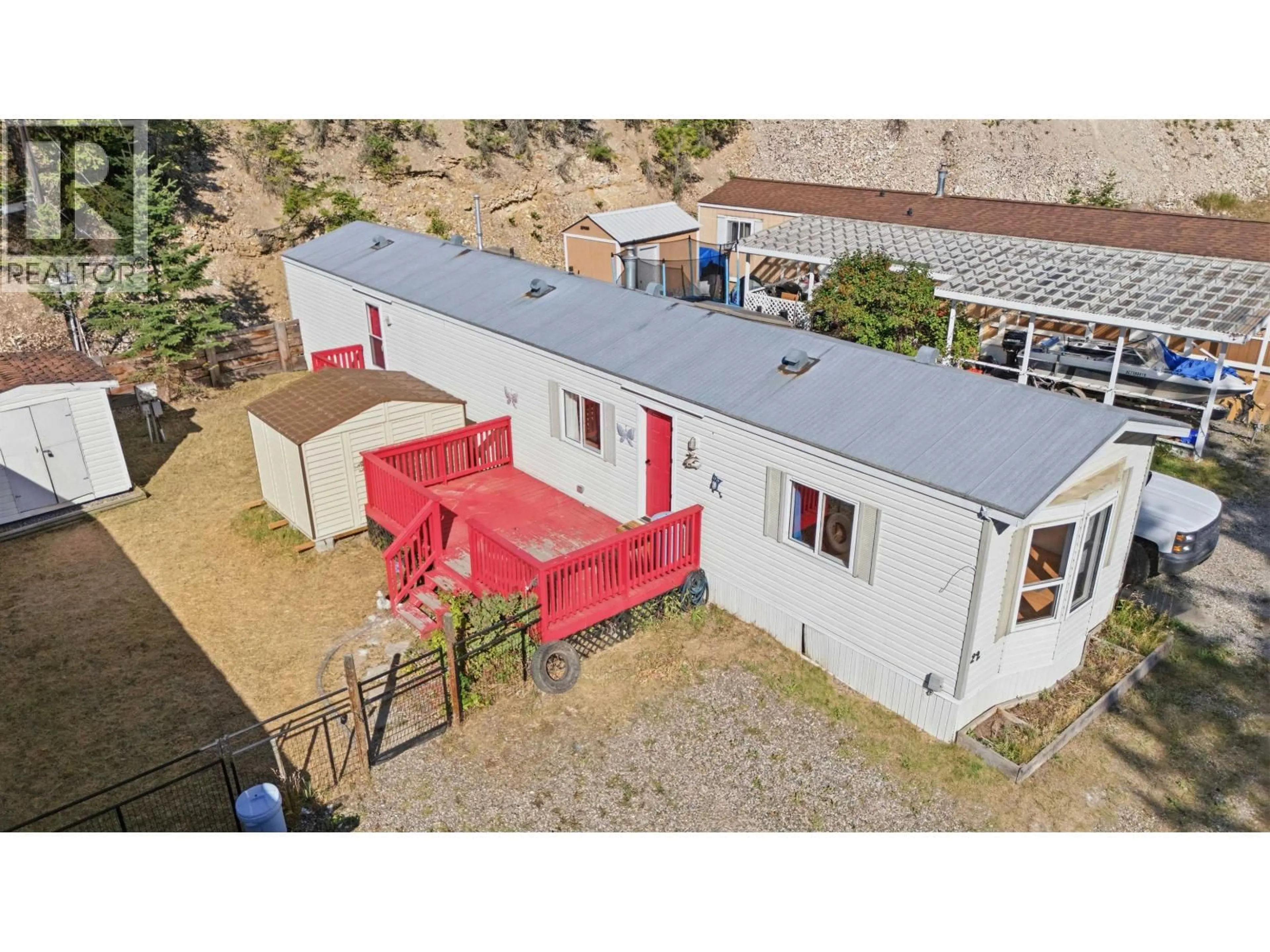 A pic from outside/outdoor area/front of a property/back of a property/a pic from drone, building for 22 - 803 HODGSON ROAD, Williams Lake British Columbia V2G3R2