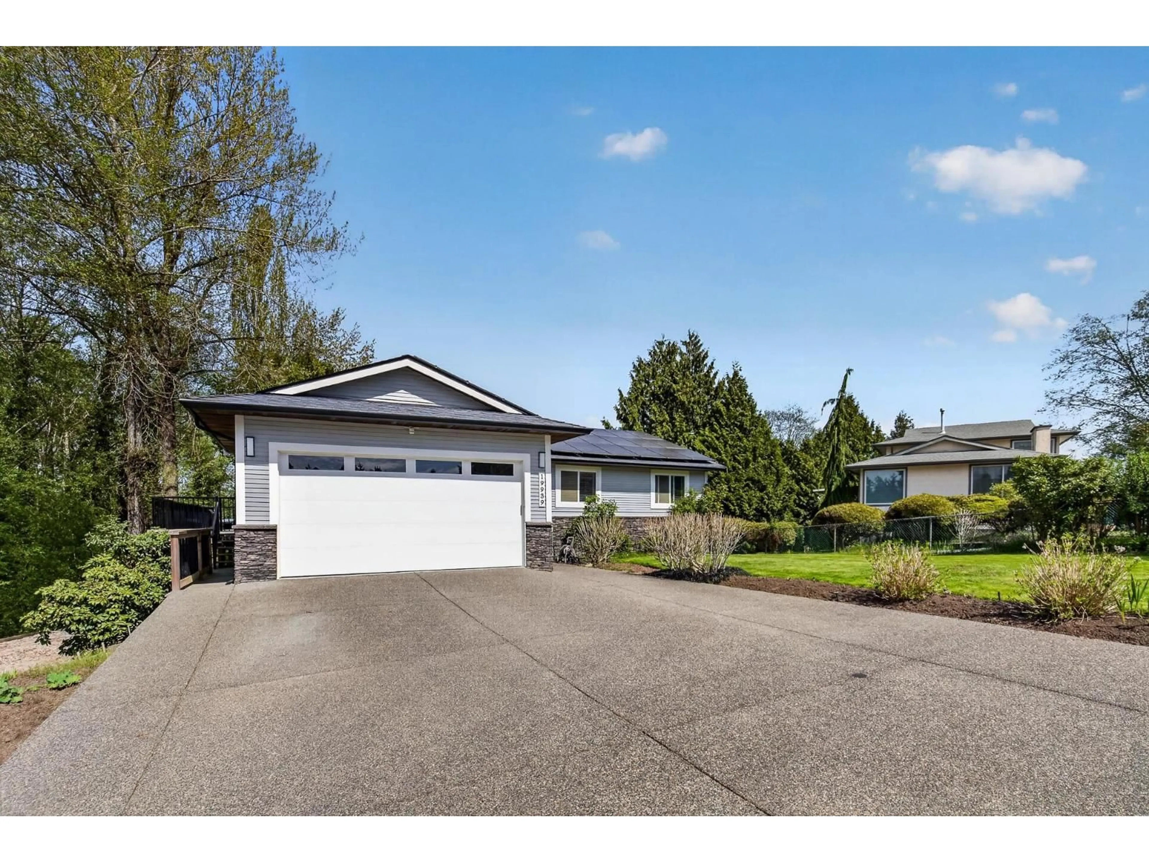 Home with vinyl exterior material, street for 19939 51 AVENUE, Langley British Columbia V3A7P2