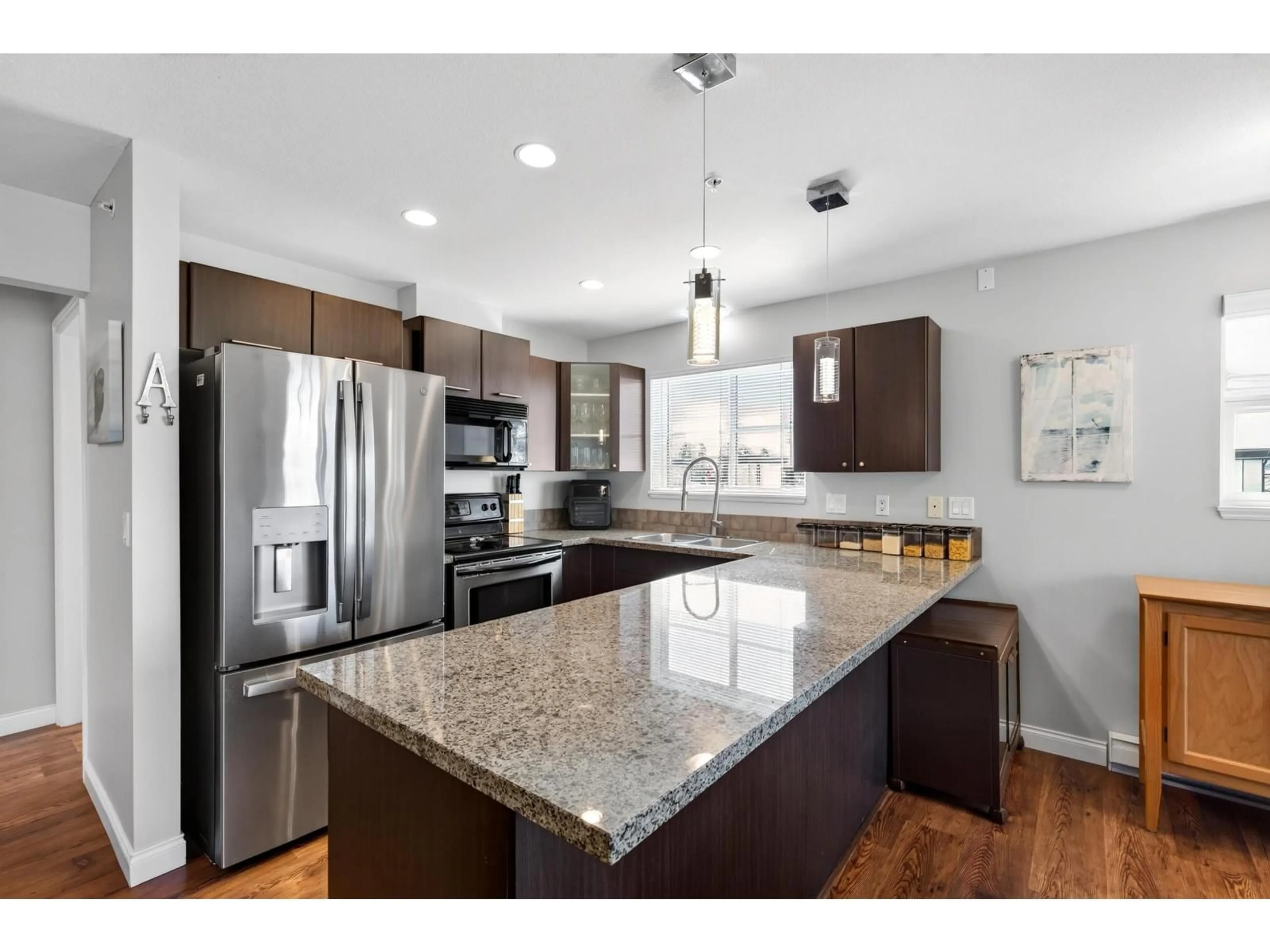 Open concept kitchen, unknown for 412 - 5488 198 STREET, Langley British Columbia V3A1G2