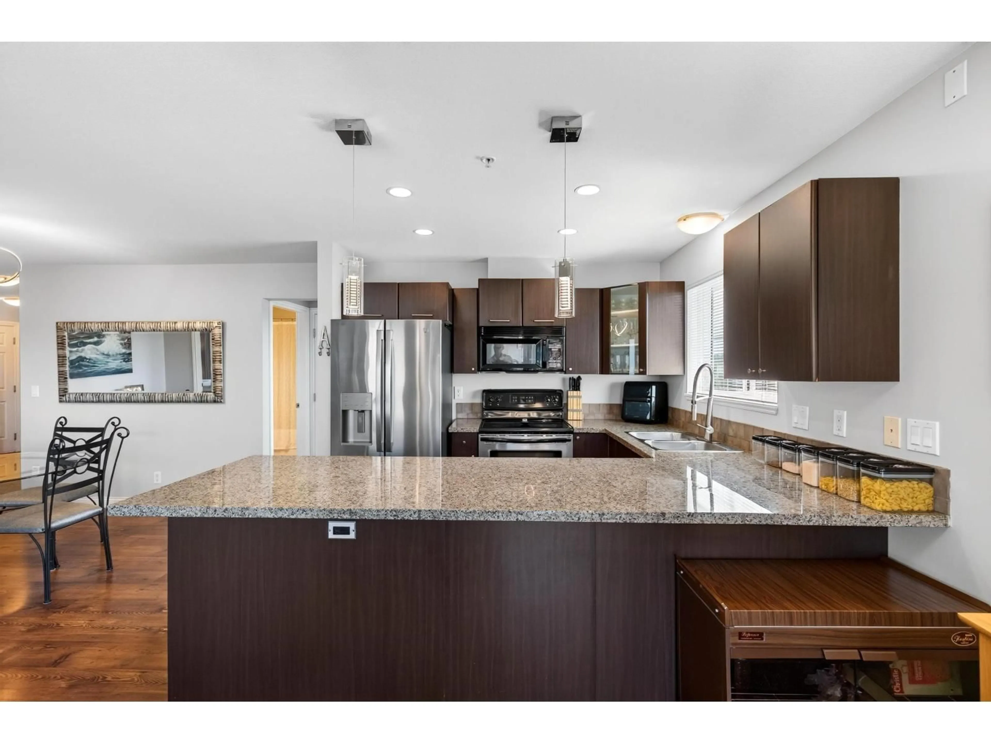 Open concept kitchen, ceramic/tile floor for 412 - 5488 198 STREET, Langley British Columbia V3A1G2