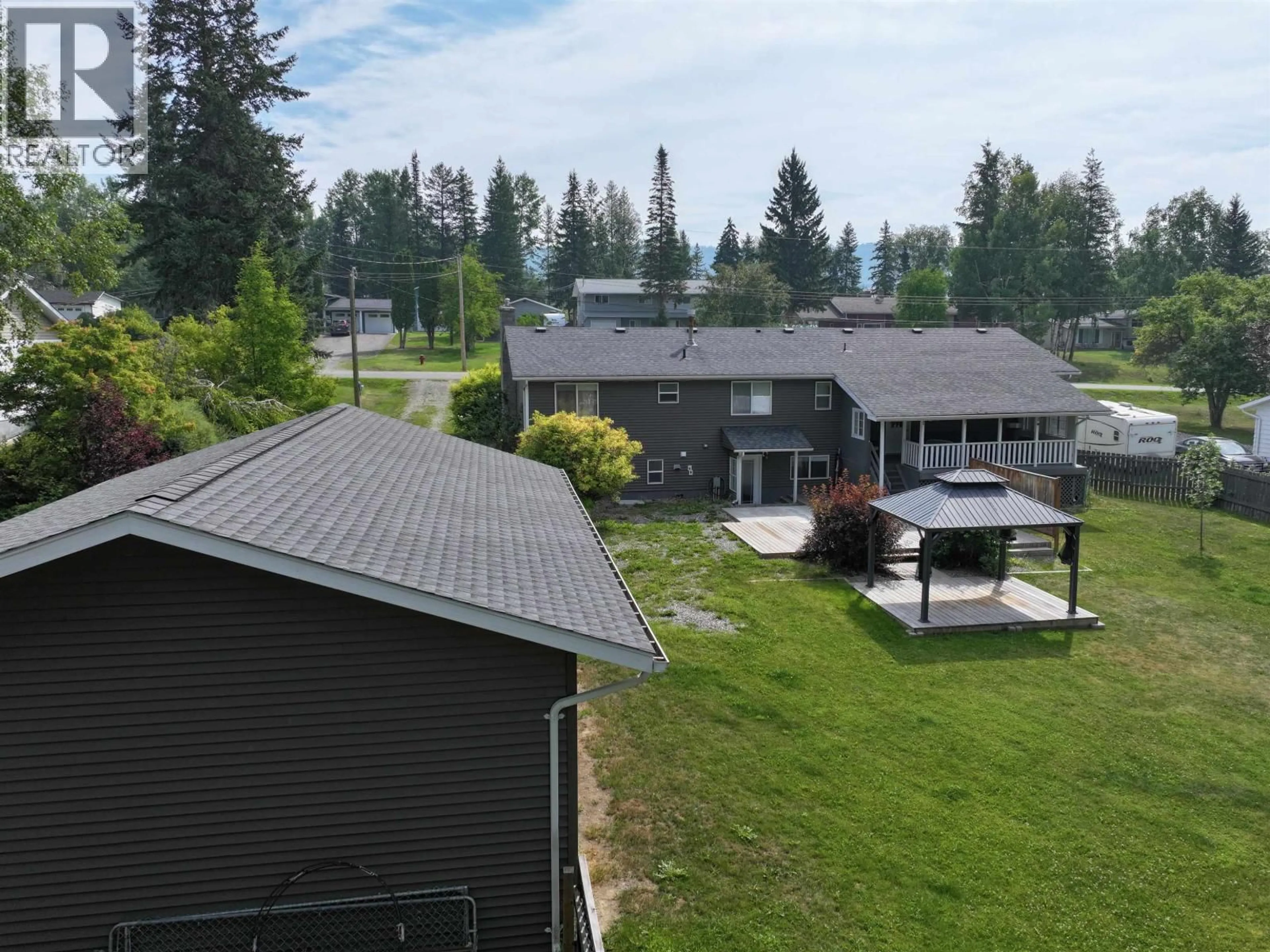 A pic from outside/outdoor area/front of a property/back of a property/a pic from drone, mountain view for 241 ENEMARK ROAD, Quesnel British Columbia V2J4G8