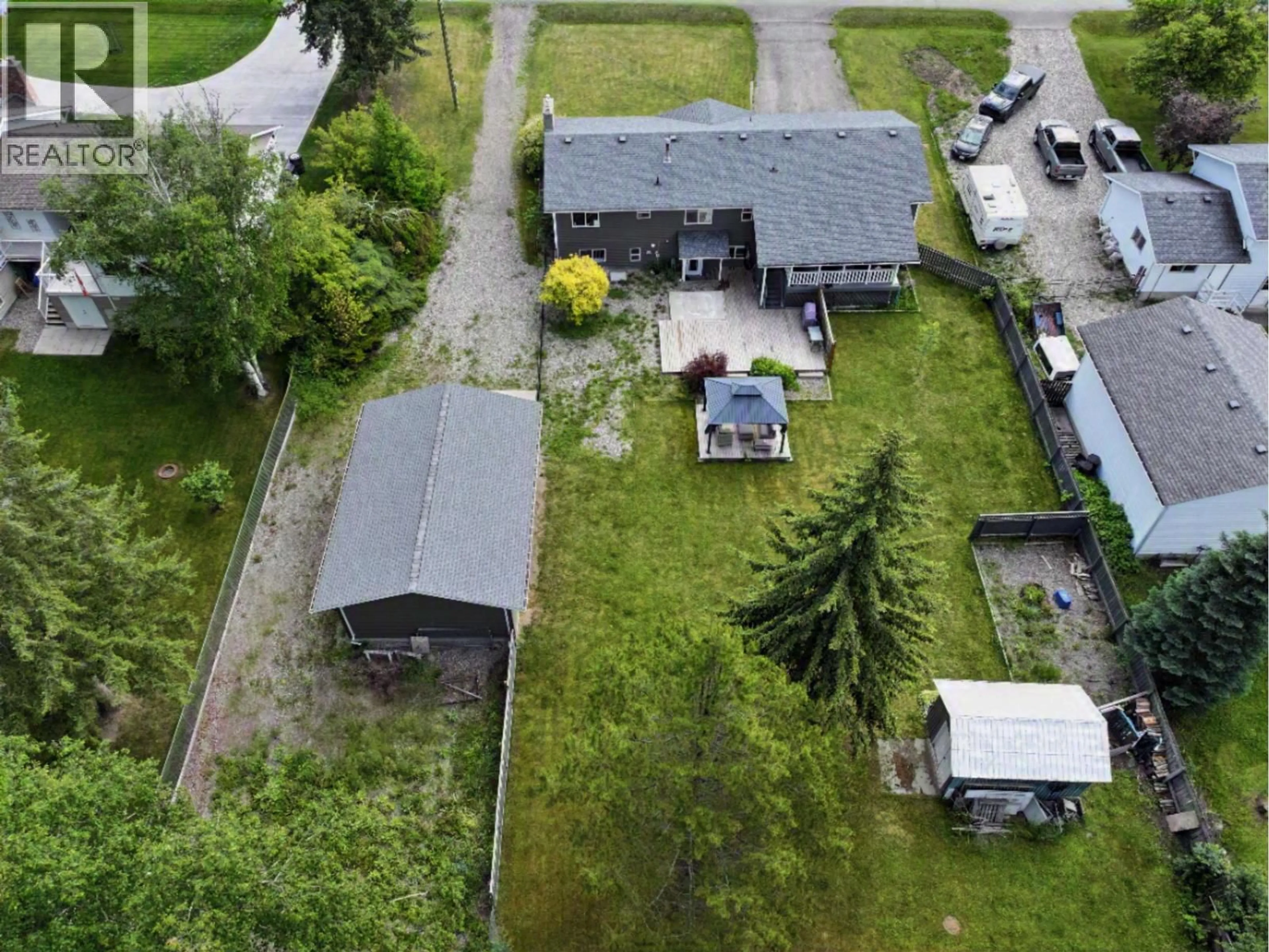 A pic from outside/outdoor area/front of a property/back of a property/a pic from drone, street for 241 ENEMARK ROAD, Quesnel British Columbia V2J4G8