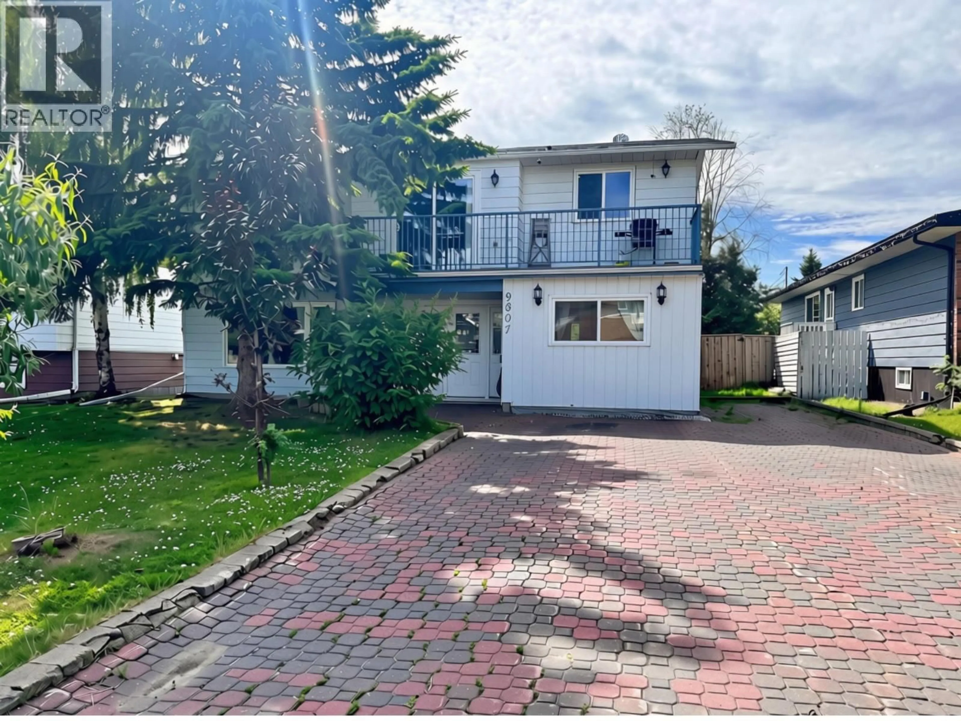 A pic from outside/outdoor area/front of a property/back of a property/a pic from drone, street for 9807 114 AVENUE, Fort St. John British Columbia V1J4R8