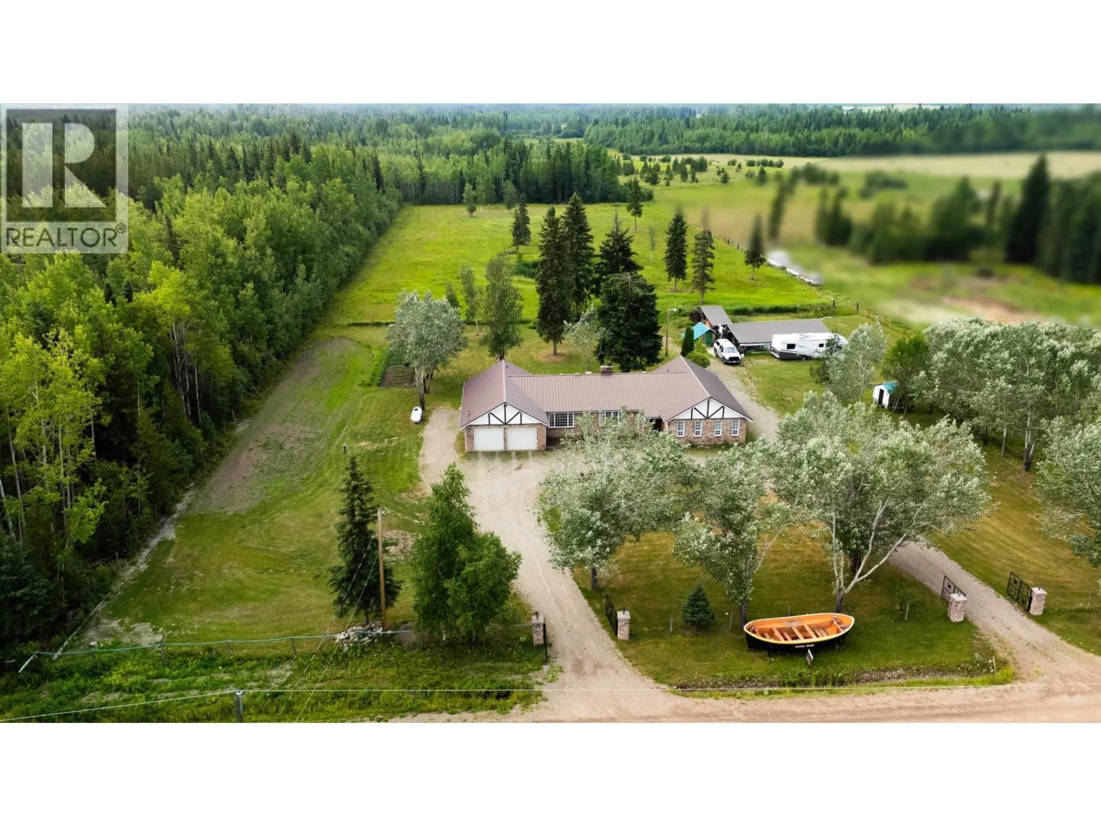 A pic from outside/outdoor area/front of a property/back of a property/a pic from drone, unknown for 5455 COURVAL ROAD, Prince George British Columbia V2N6A4