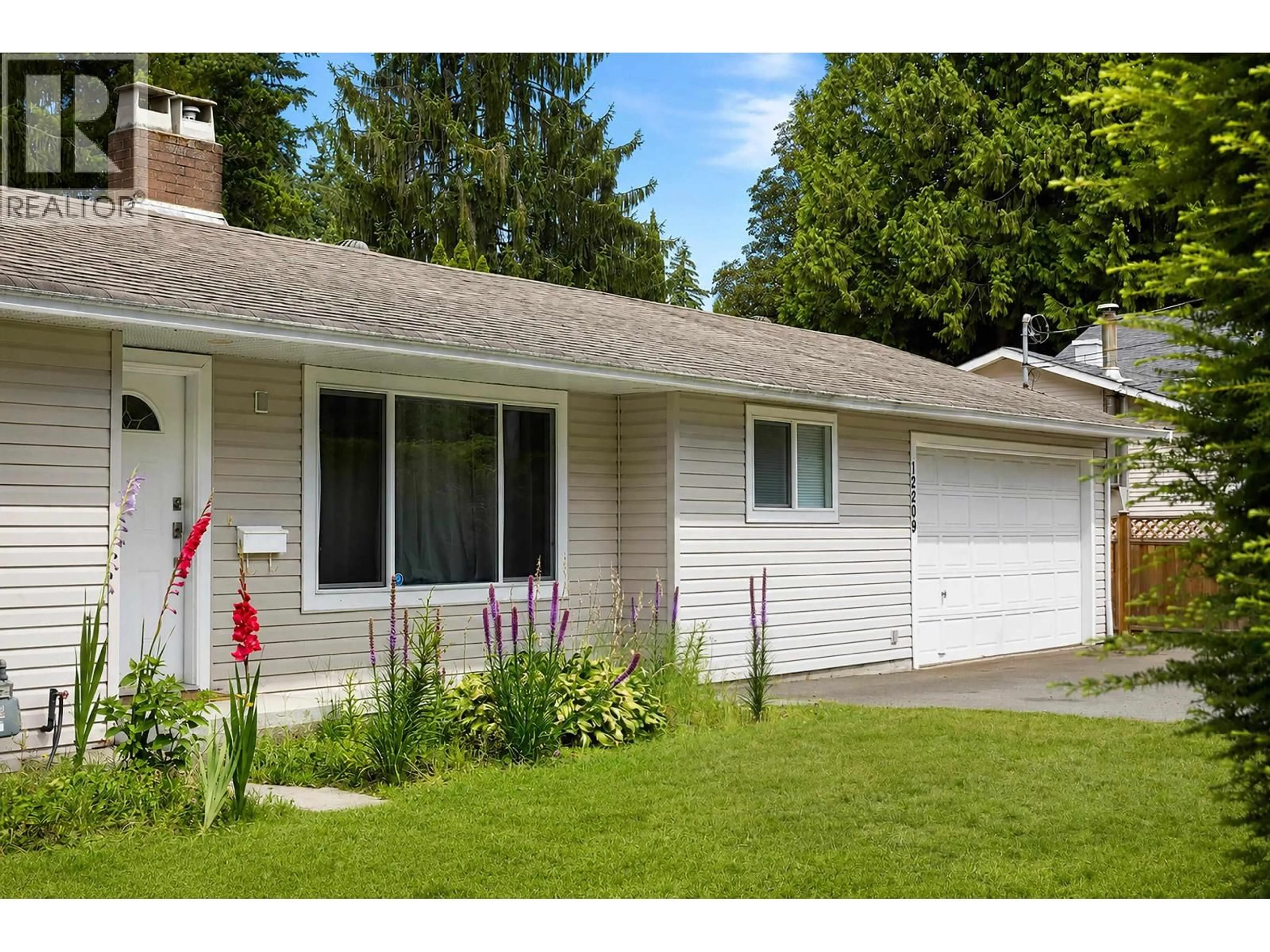 Home with vinyl exterior material, street for 12209 SKILLEN STREET, Maple Ridge British Columbia V2X4X4