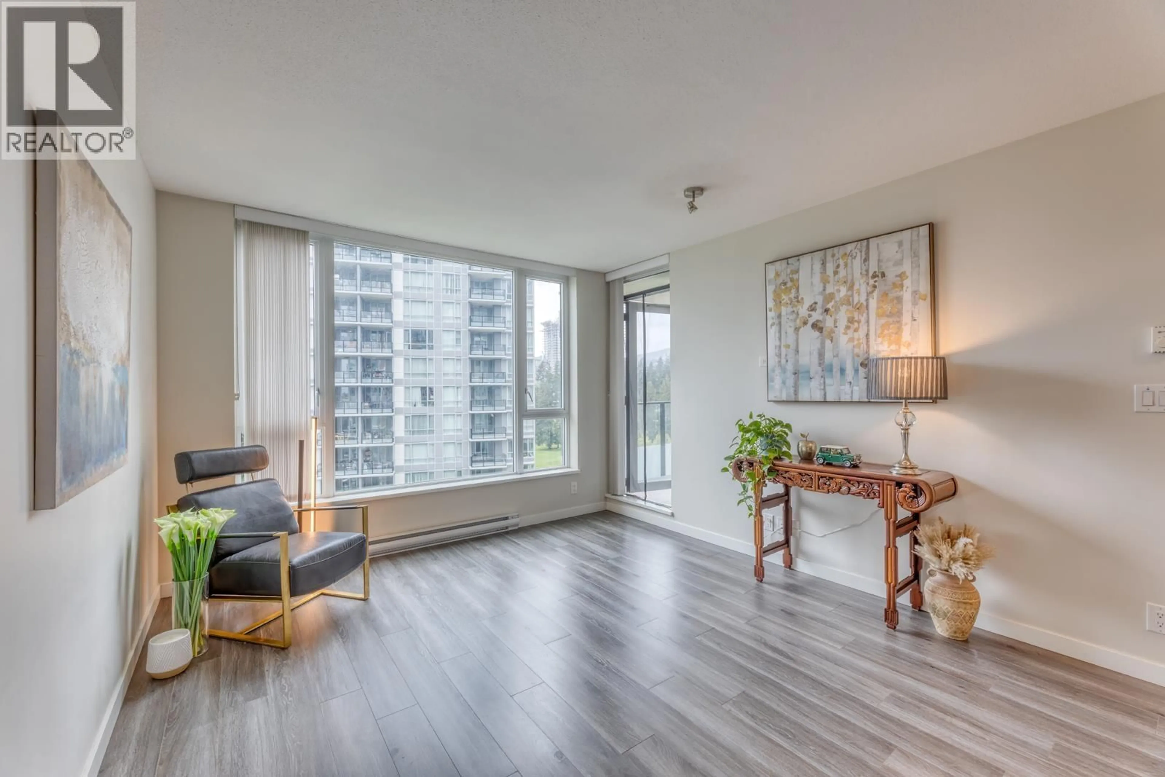 Living room with furniture, wood/laminate floor for 1004 - 3100 WINDSOR GATE, Coquitlam British Columbia V3B0P3