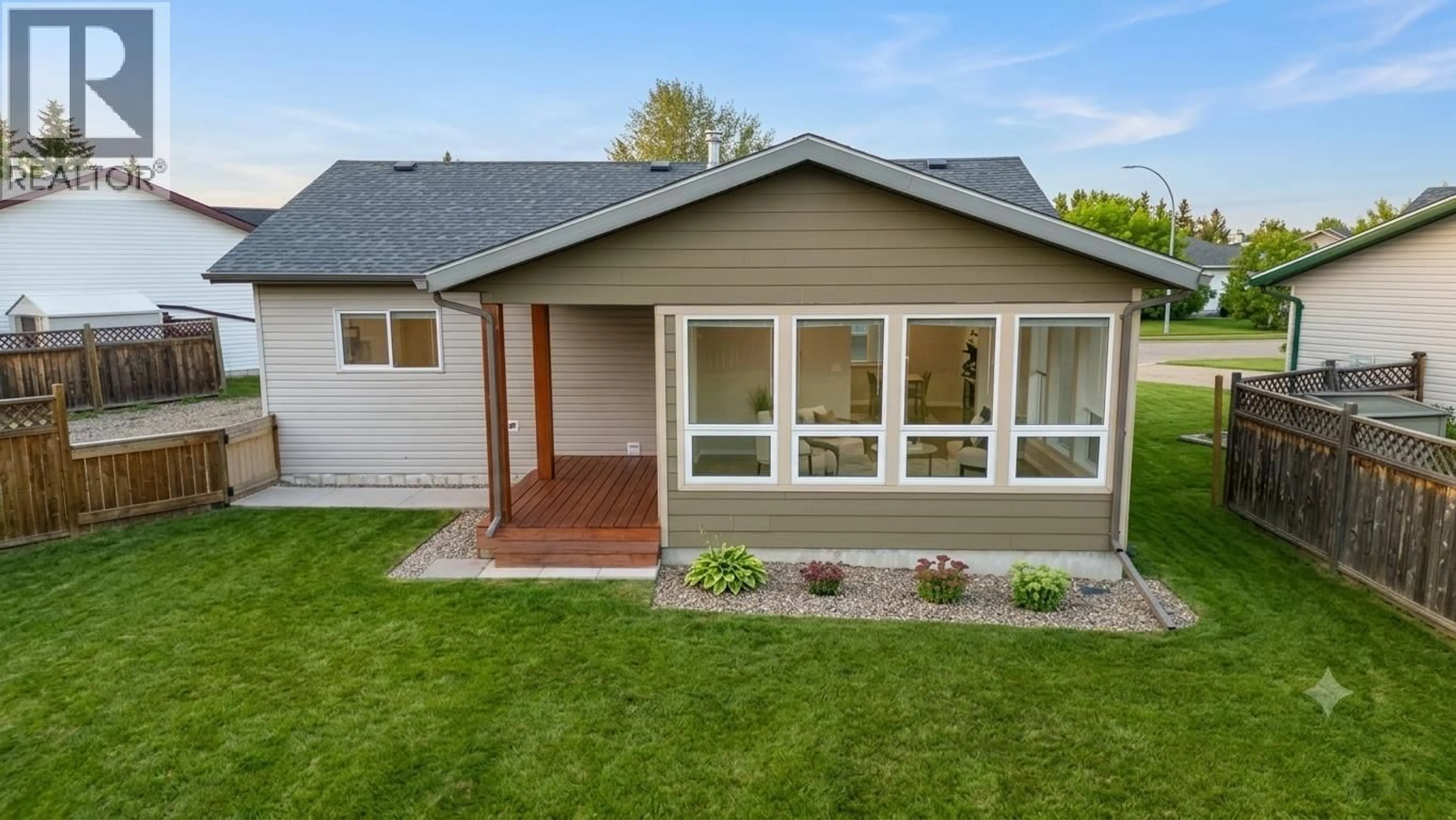 Home with vinyl exterior material, street for 8724 81A STREET, Fort St. John British Columbia V1J7H1
