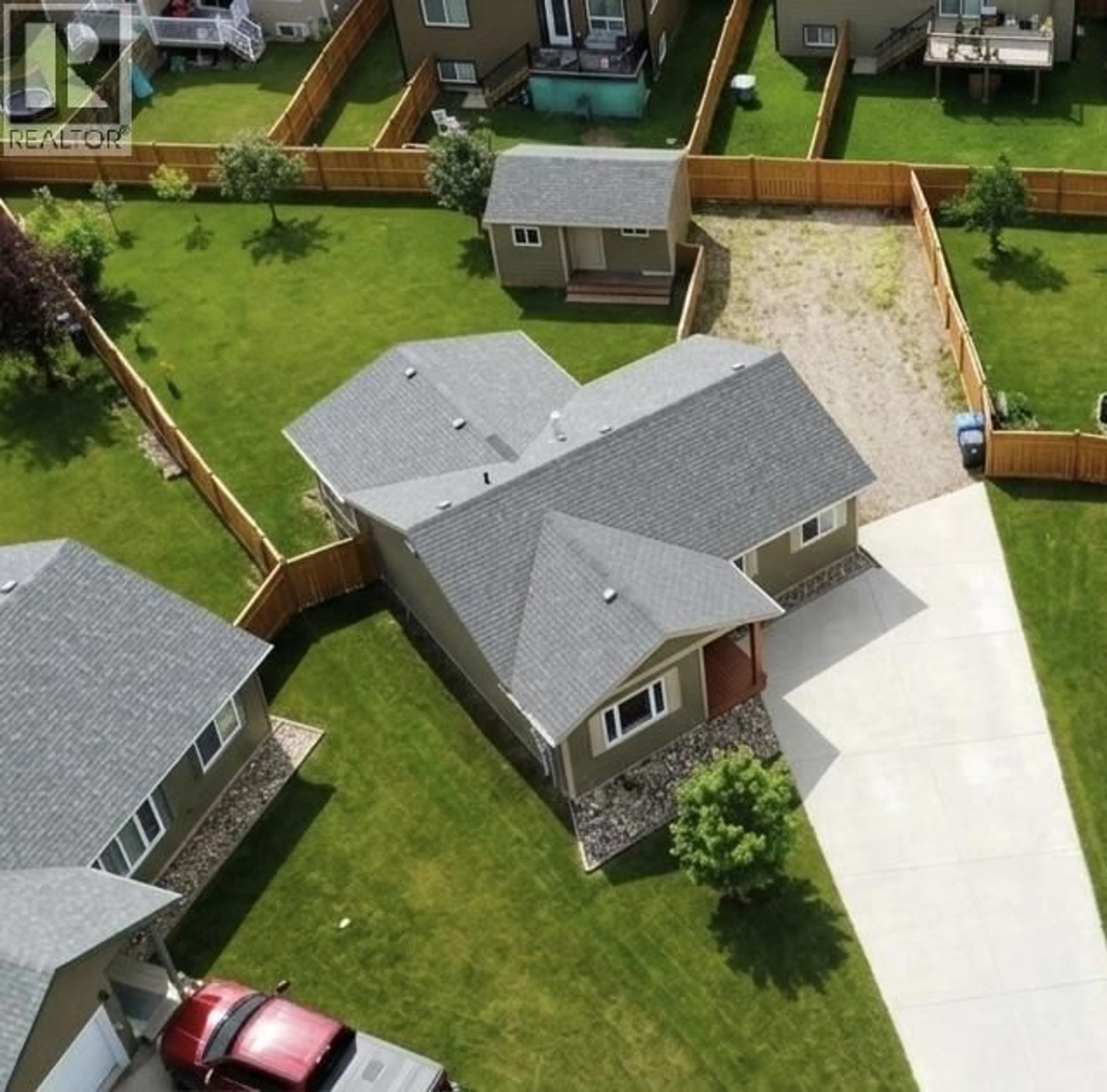 A pic from outside/outdoor area/front of a property/back of a property/a pic from drone, street for 8724 81A STREET, Fort St. John British Columbia V1J7H1