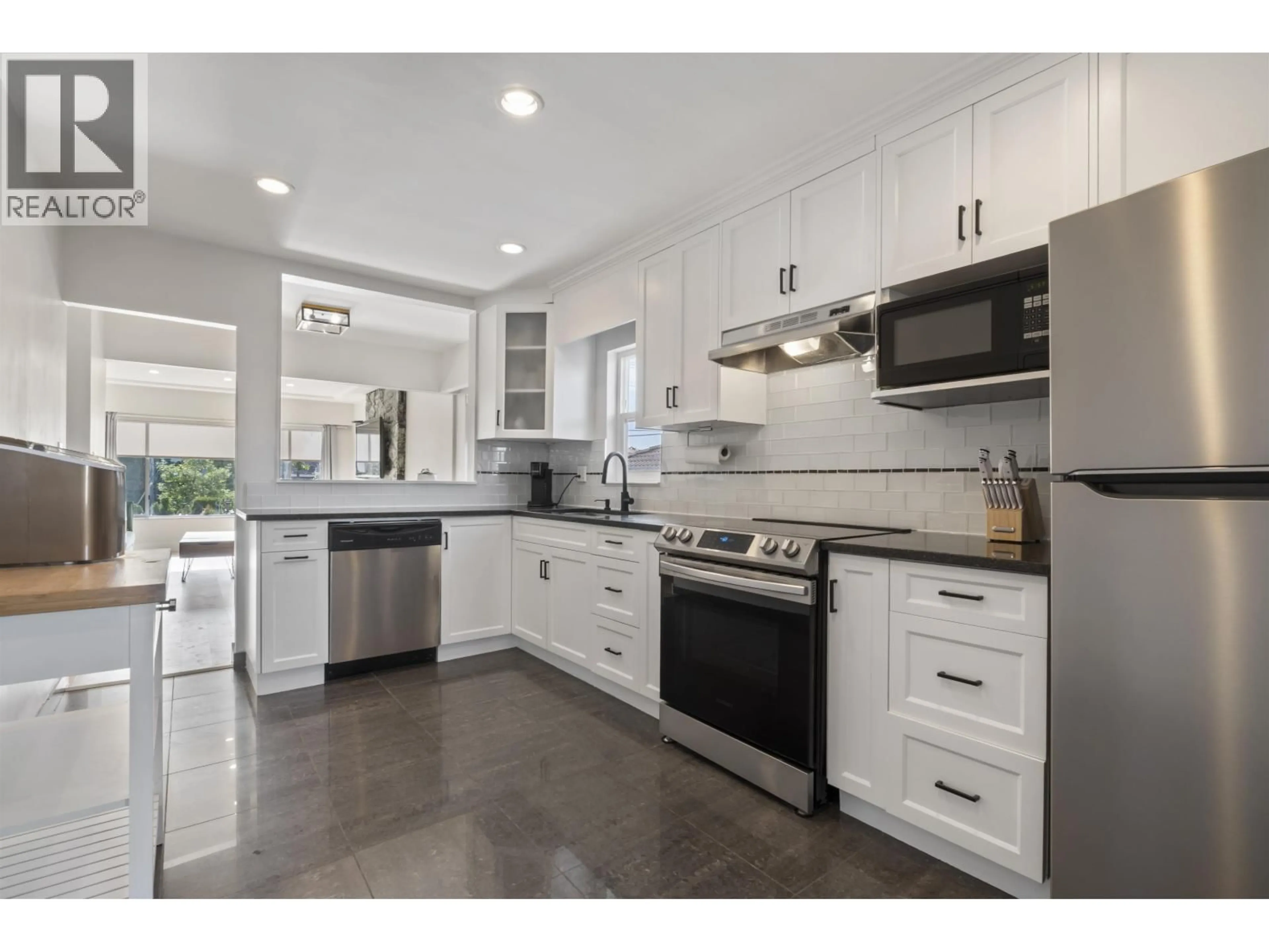 Open concept kitchen, ceramic/tile floor for 4136 SKEENA STREET, Vancouver British Columbia V5R2L3