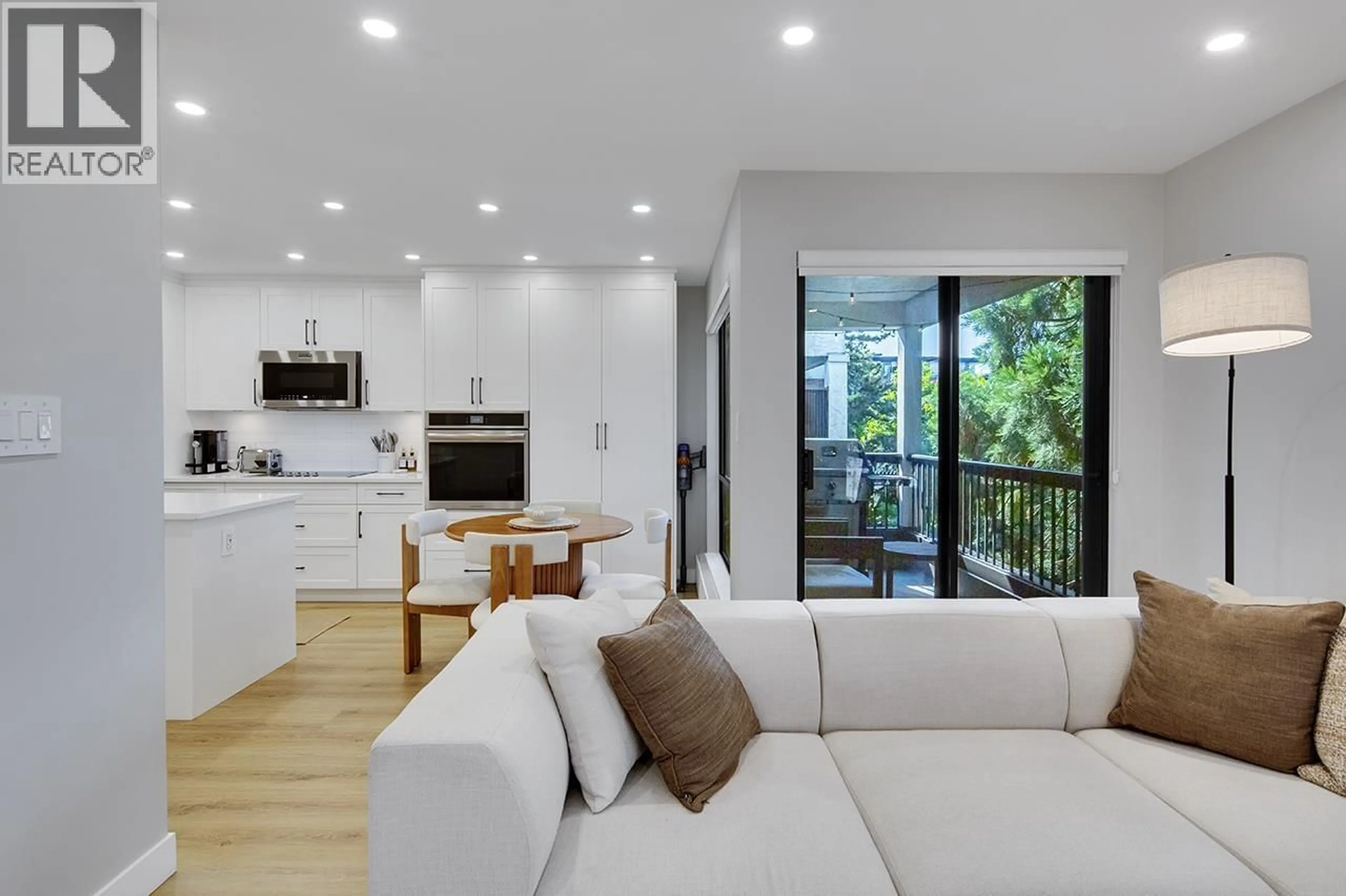 Living room with furniture, wood/laminate floor for 303 - 1877 5TH AVENUE, Vancouver British Columbia V6J1P5