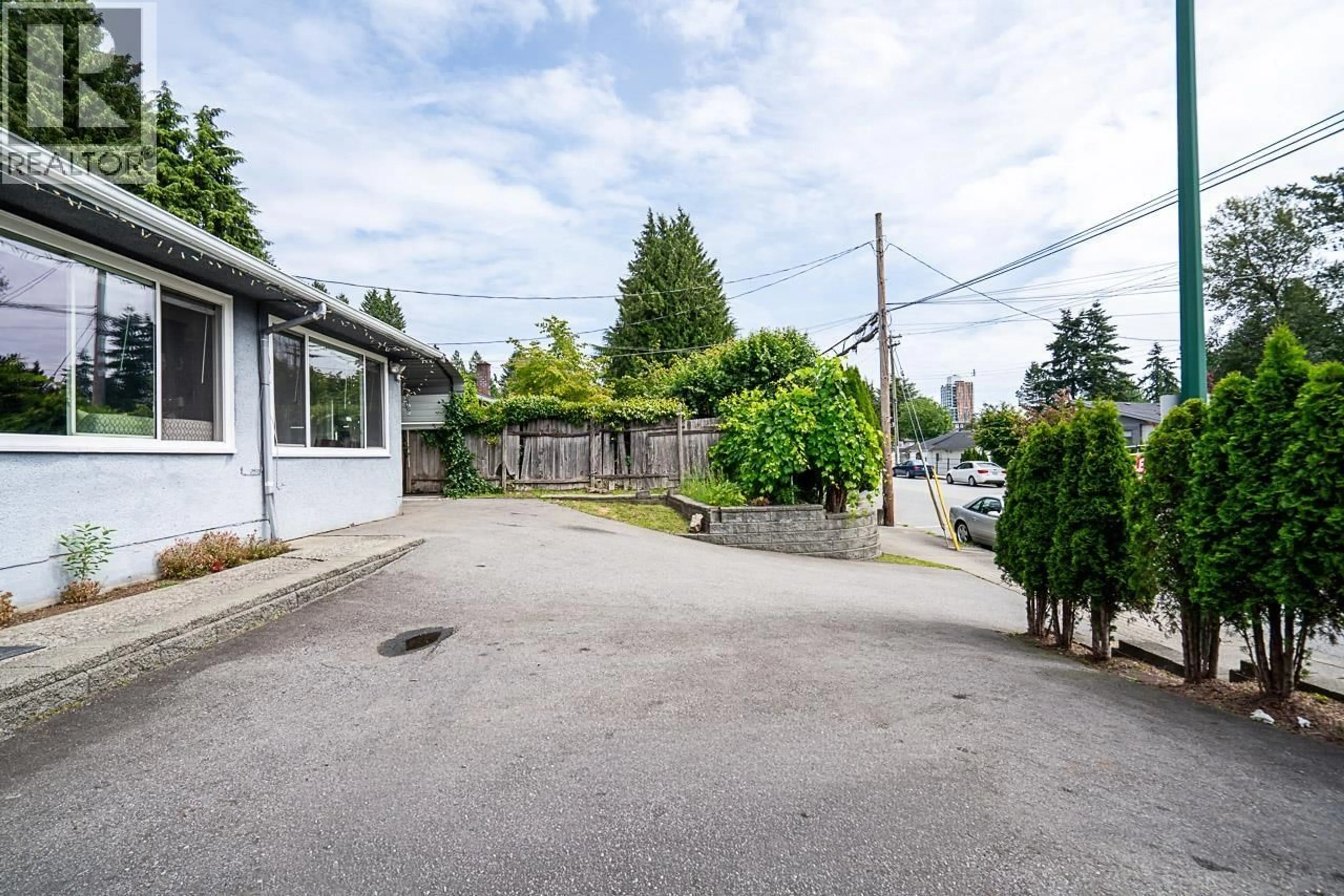 A pic from outside/outdoor area/front of a property/back of a property/a pic from drone, street for 711 ALDERSON AVENUE, Coquitlam British Columbia V3K1T7