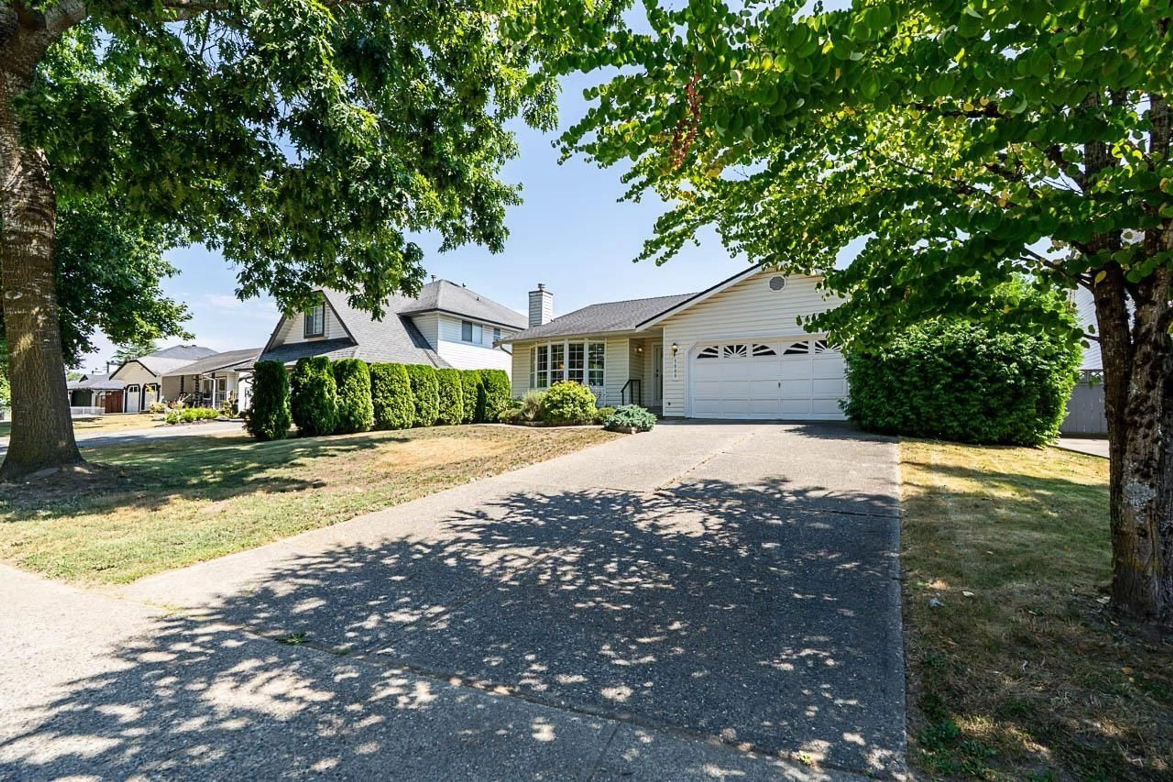 A pic from outside/outdoor area/front of a property/back of a property/a pic from drone, street for 5880 169 STREET, Surrey British Columbia V3S6Z9