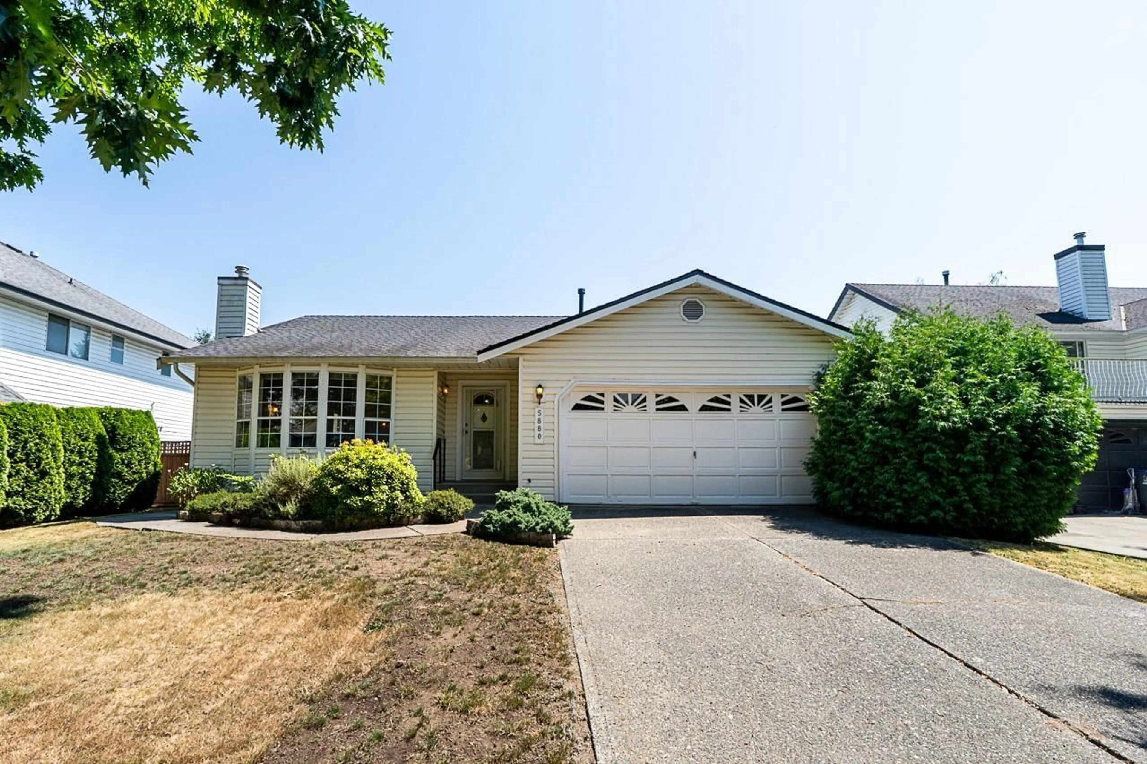 Home with vinyl exterior material, street for 5880 169 STREET, Surrey British Columbia V3S6Z9