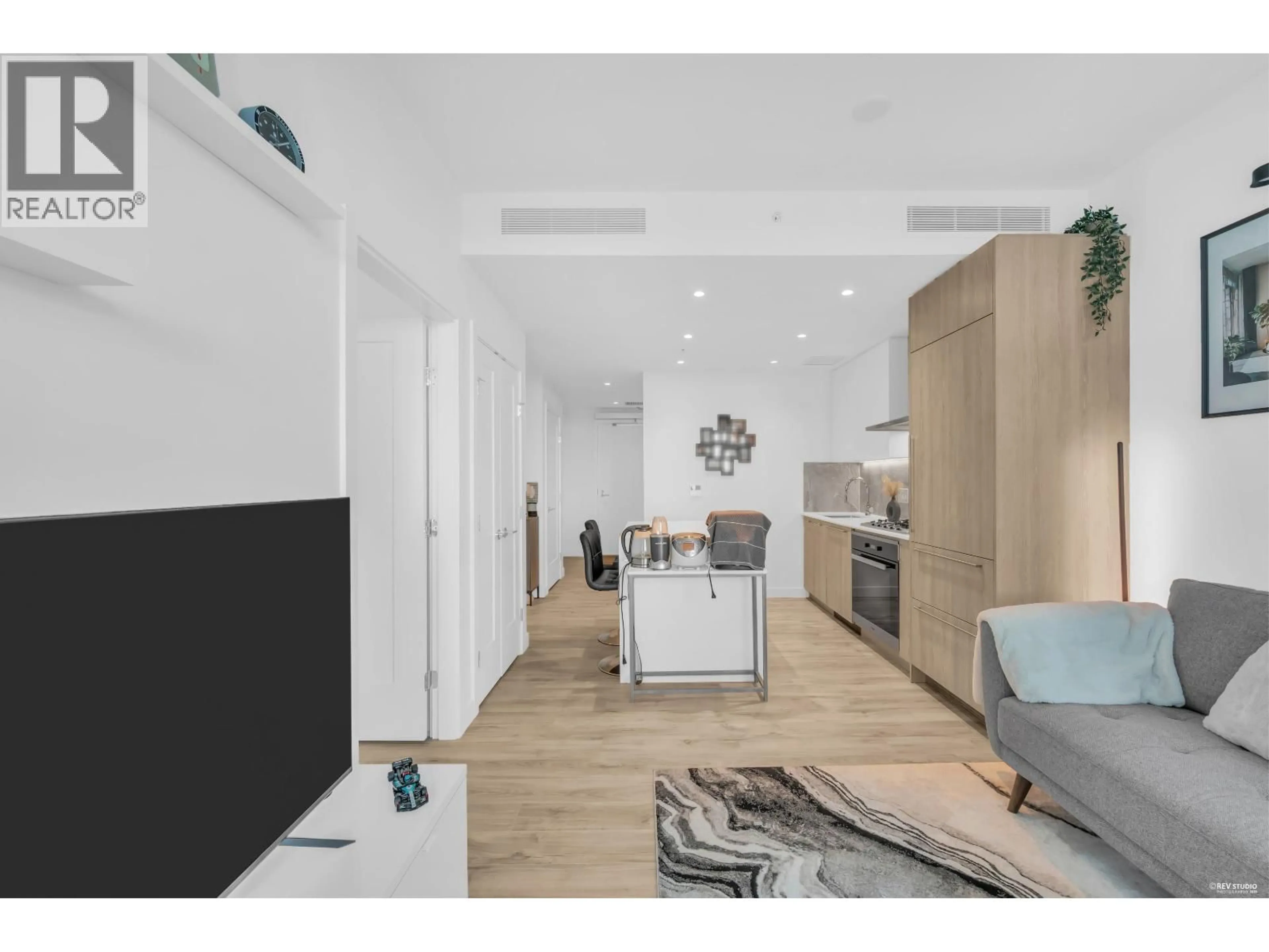 Open concept kitchen, wood/laminate floor for 1702 - 2288 ALPHA AVENUE, Burnaby British Columbia V5C0L9