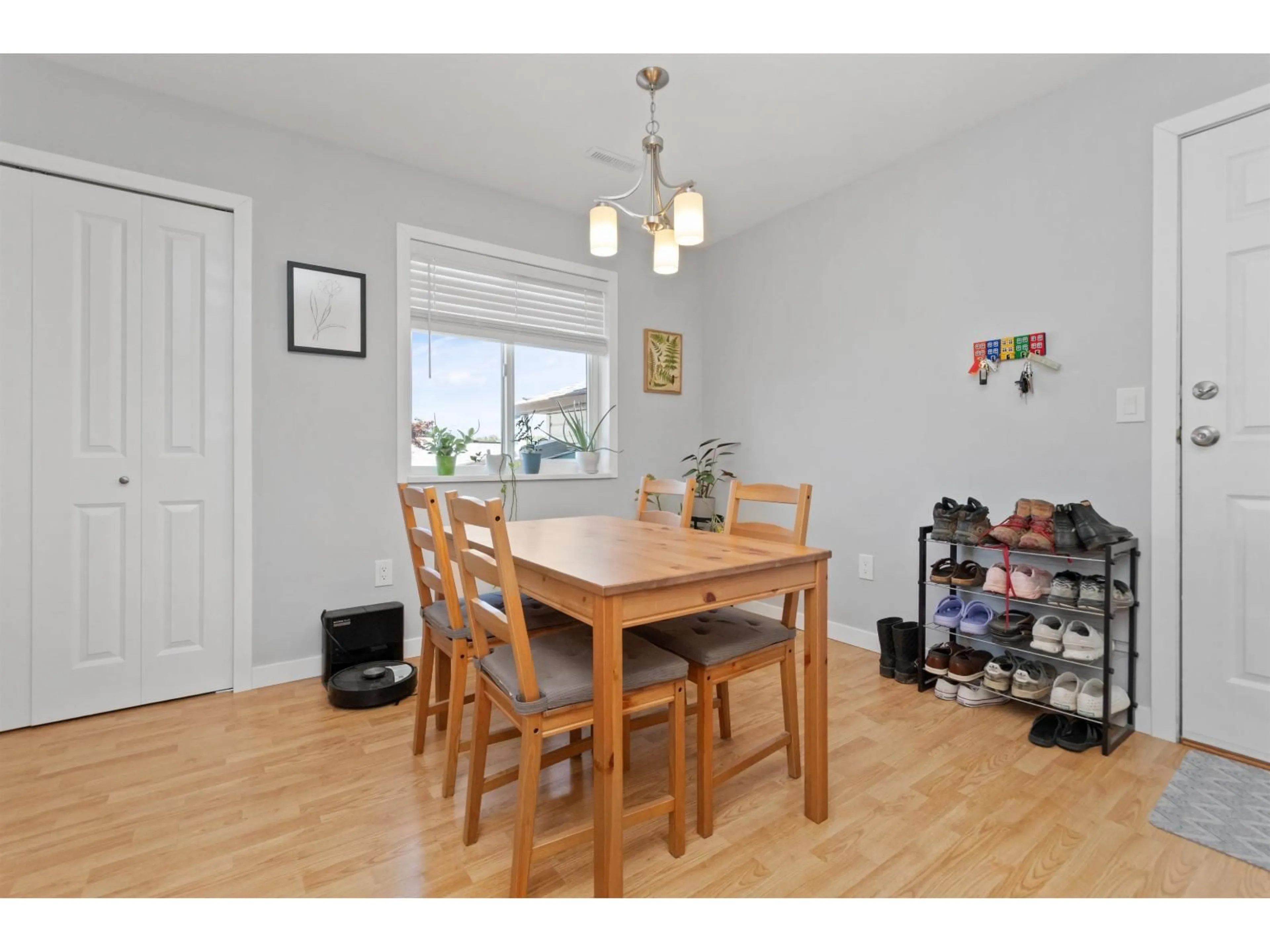 Dining room, wood/laminate floor for 10 - 7715 LUCKAKUCK PLACE, Chilliwack British Columbia V2R3N6