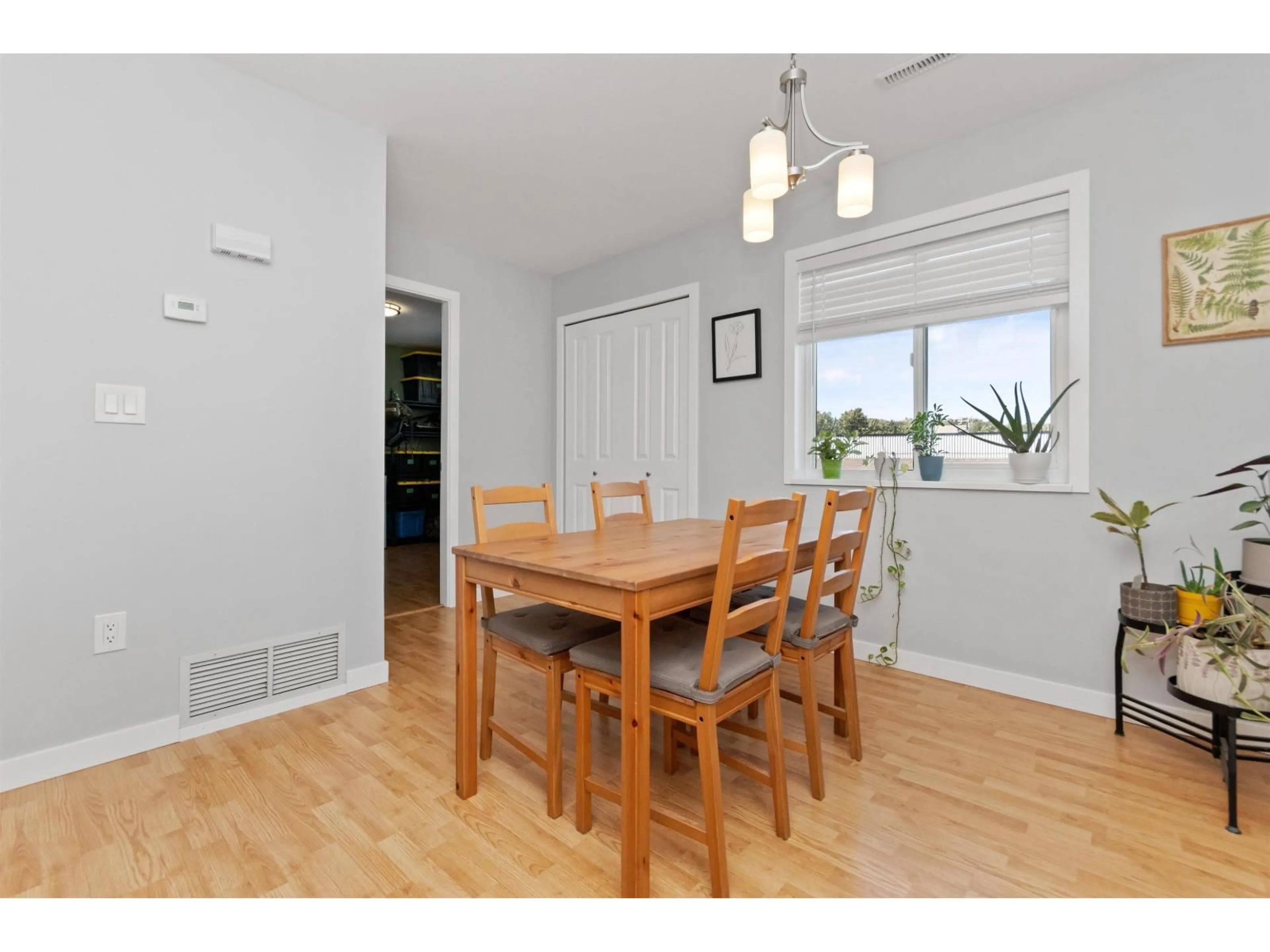Dining room, wood/laminate floor for 10 - 7715 LUCKAKUCK PLACE, Chilliwack British Columbia V2R3N6