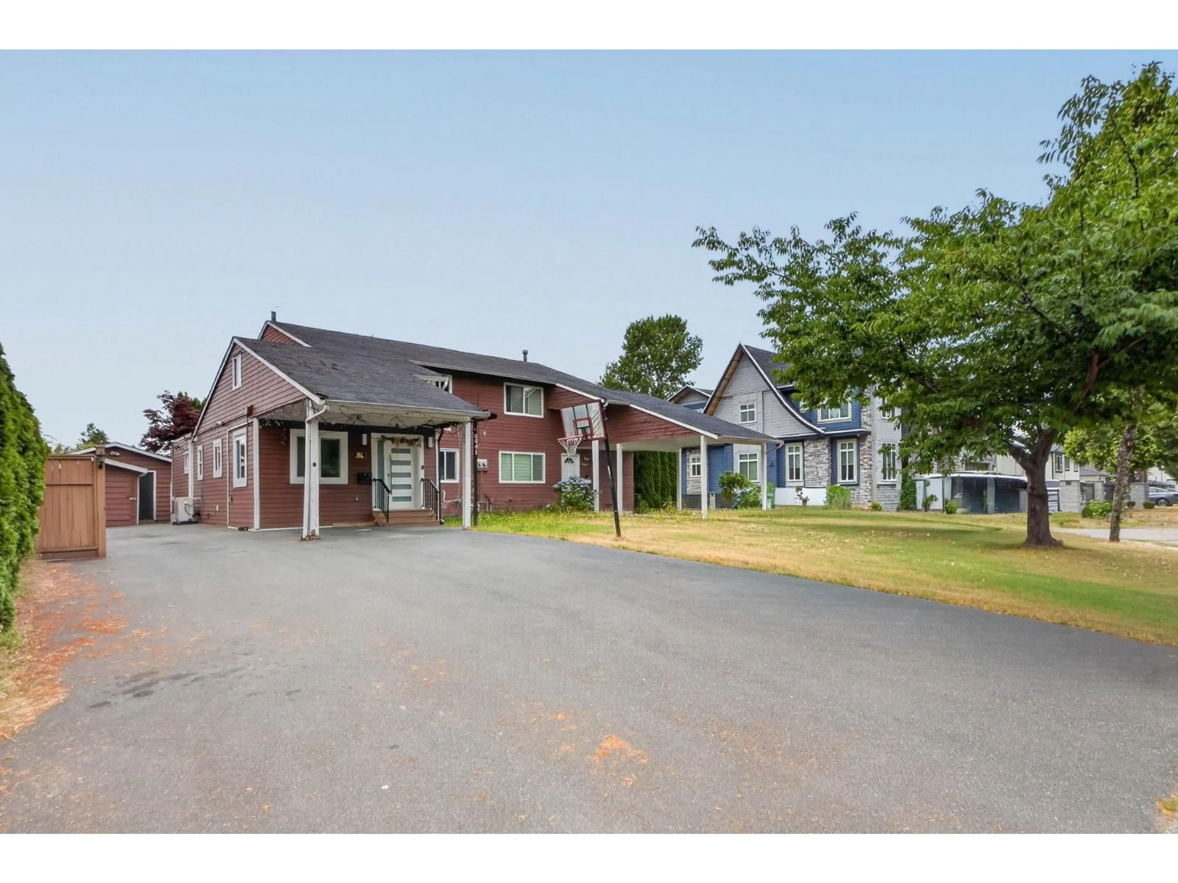 A pic from outside/outdoor area/front of a property/back of a property/a pic from drone, street for 9441 132A STREET, Surrey British Columbia V3V6W3