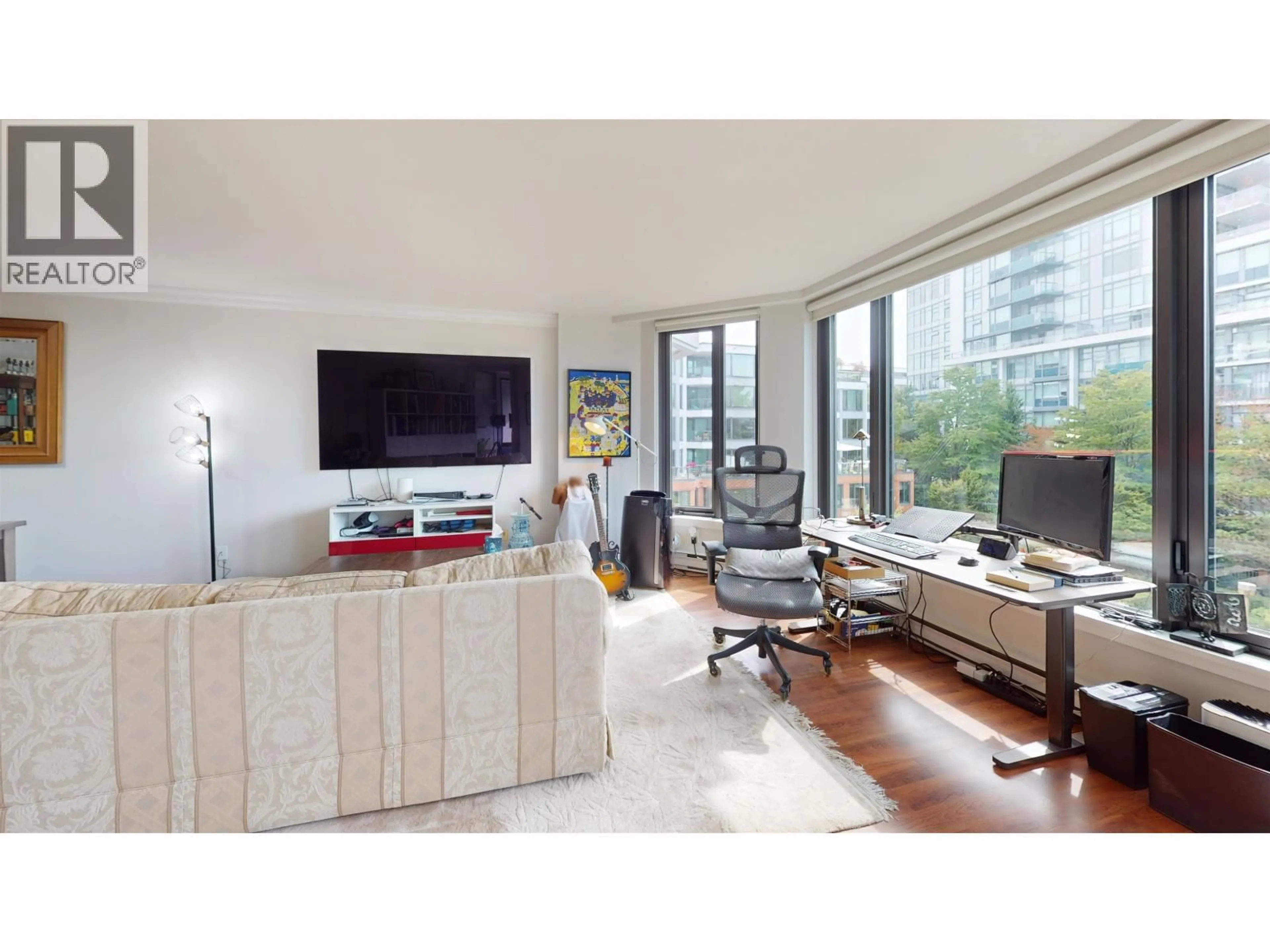 Living room with furniture, wood/laminate floor for 411 - 2201 PINE STREET, Vancouver British Columbia V6J5E7