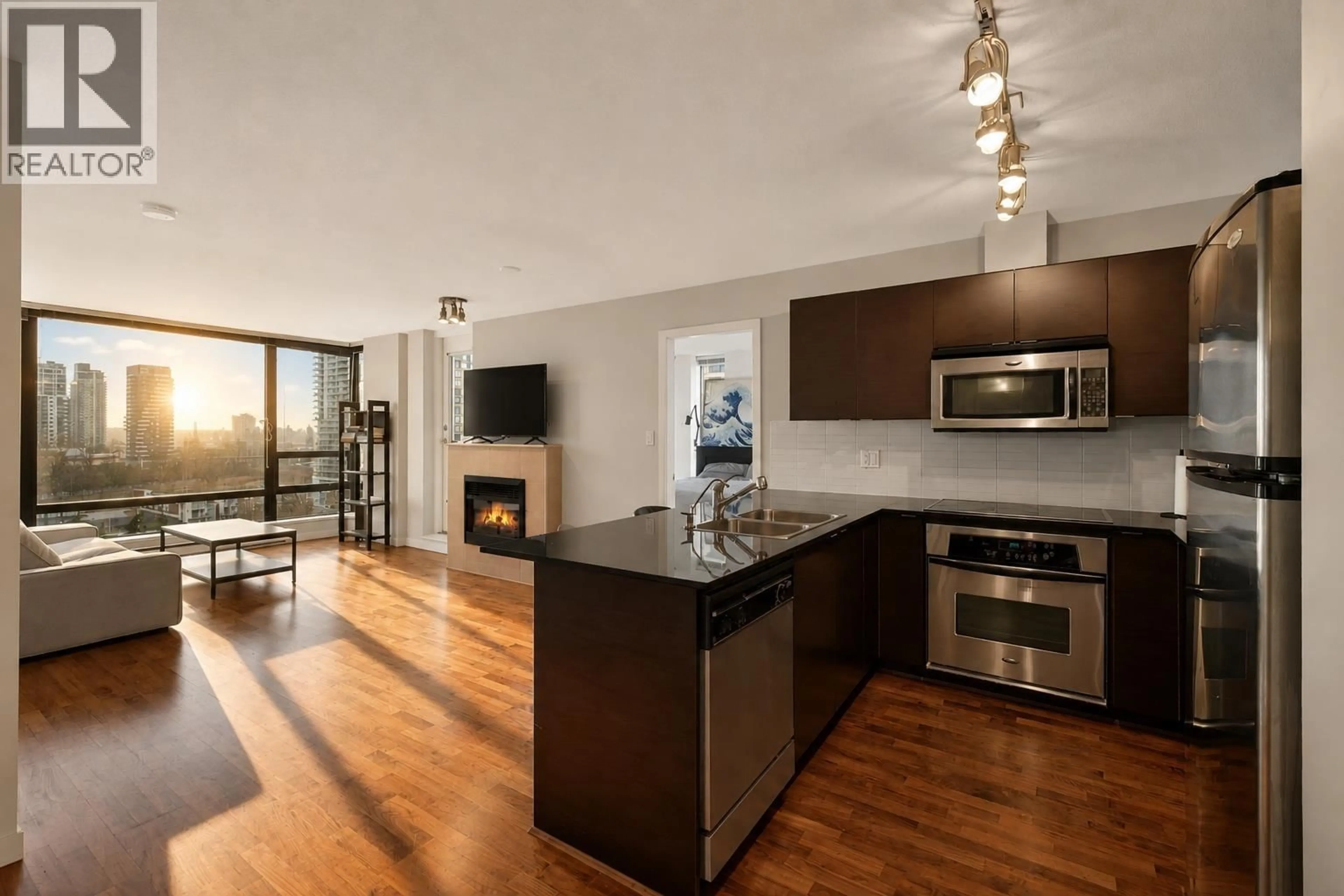 Open concept kitchen, wood/laminate floor for 1202 - 4182 DAWSON STREET, Burnaby British Columbia V5C0A2