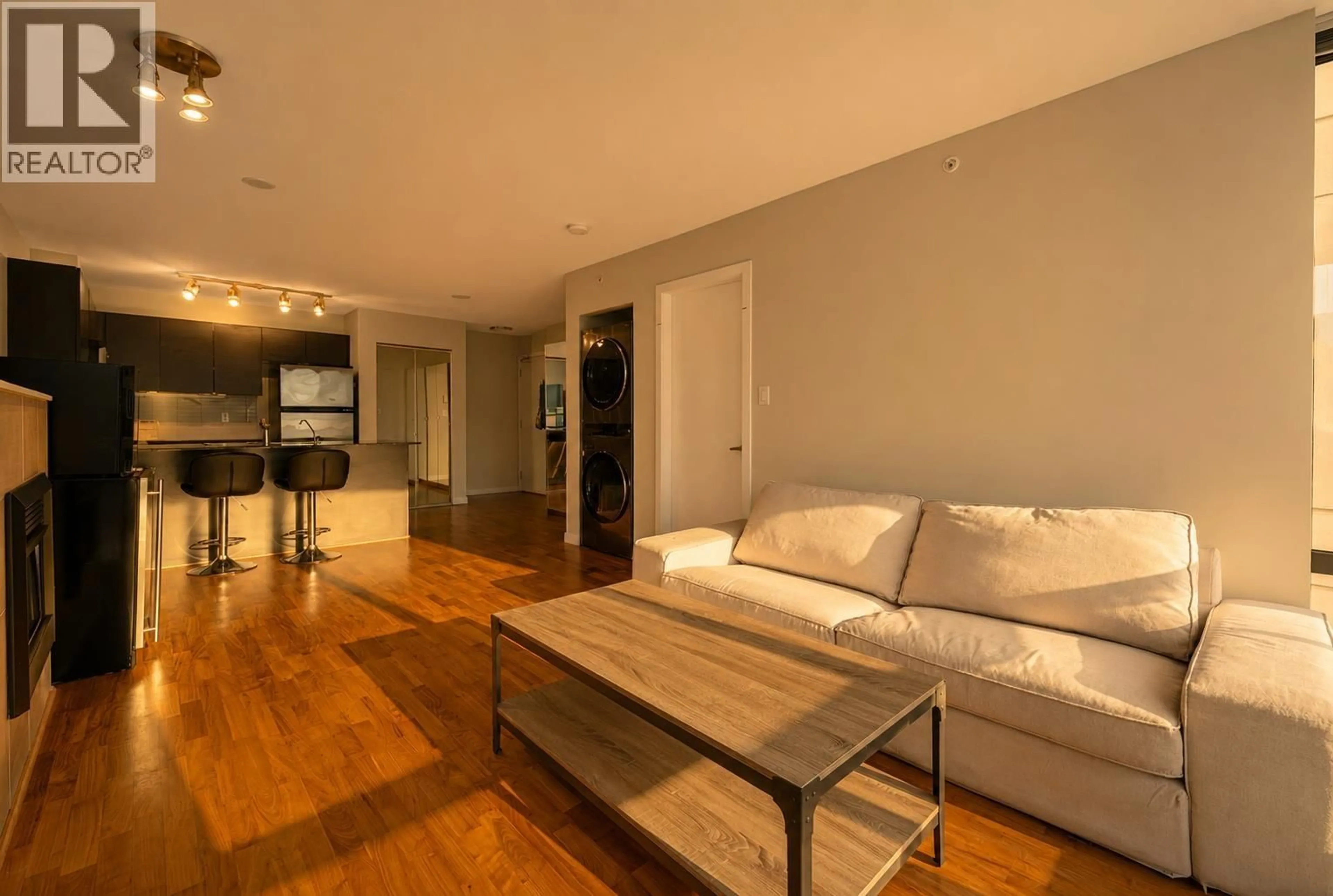 Living room with furniture, wood/laminate floor for 1202 - 4182 DAWSON STREET, Burnaby British Columbia V5C0A2